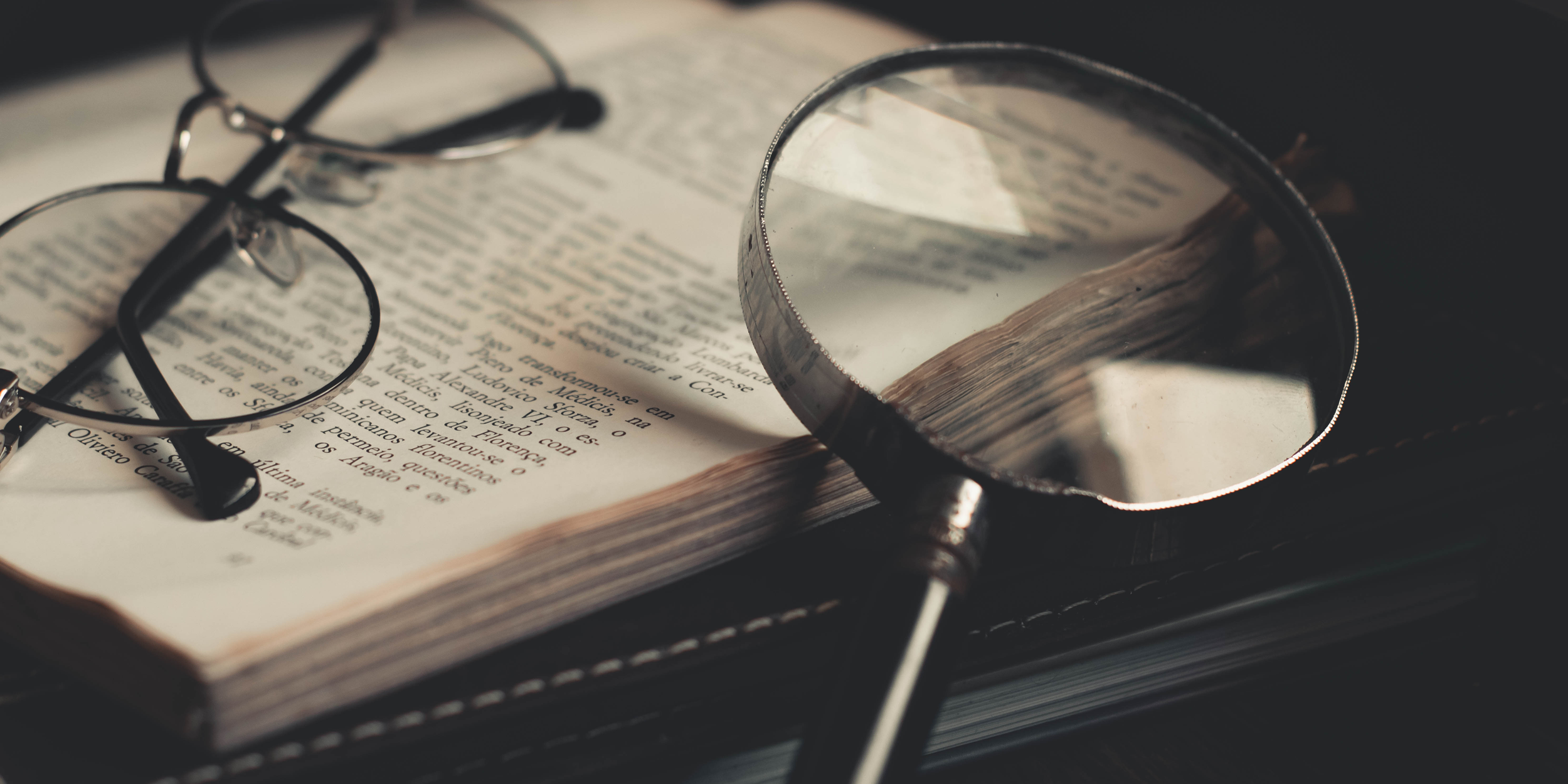 Magnifying glass and documents, workplace investigation New Zealand