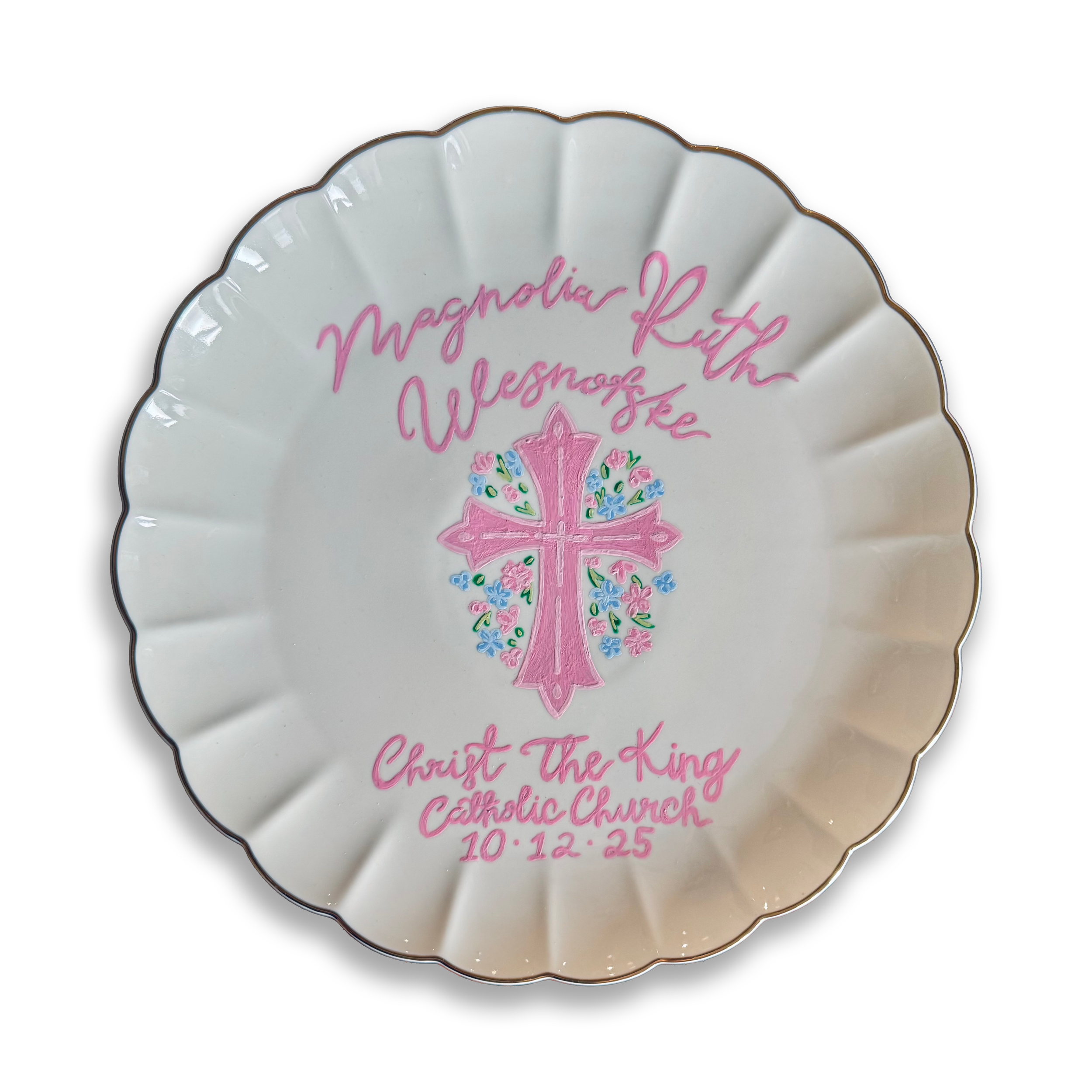 Decorative scalloped porcelain plate with pink cursive text and floral design reading "Magnolia Ruth, lessen, Christ the King, Calvary Church, 10.12.25"