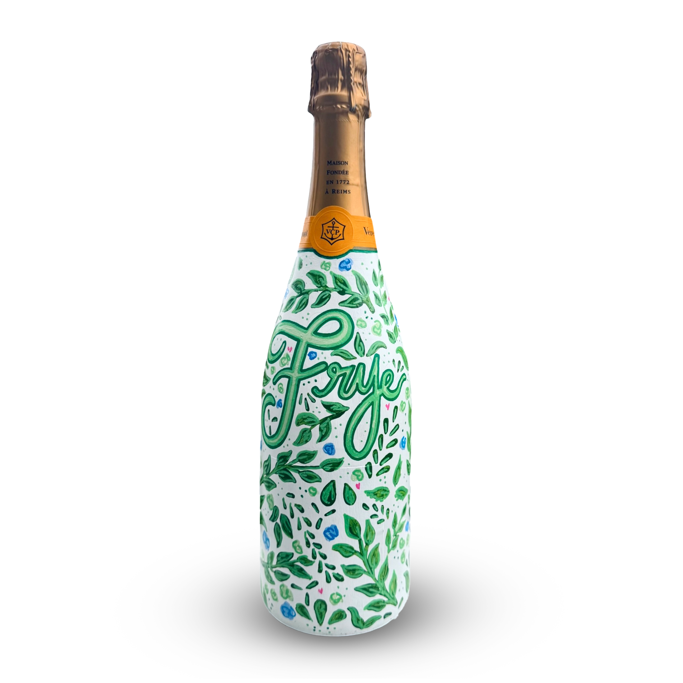 A sparkling beverage bottle with a gold foil cap and a decorative label featuring green leaves and the words 'Enjoy' and 'Celebrate' on a white background.
