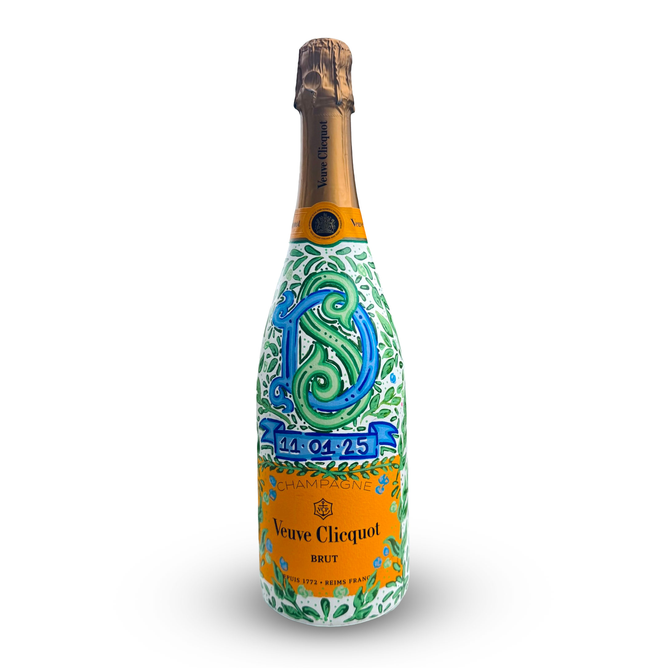 A decorative champagne bottle with colorful swirling patterns and a golden foil top