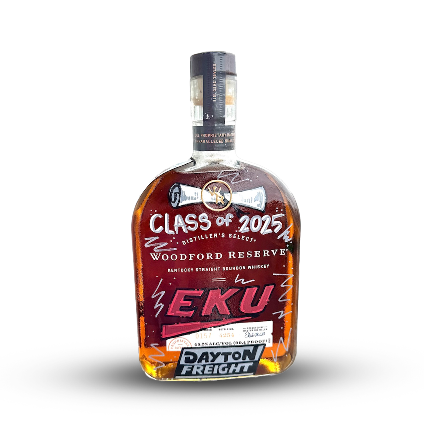 A bottle of Woodford Reserve bourbon whiskey with a custom label featuring the text "Class of 2025" and "EKU" for Eastern Kentucky University, with the Dayton Freight logo at the bottom. Custom artist liquor label.