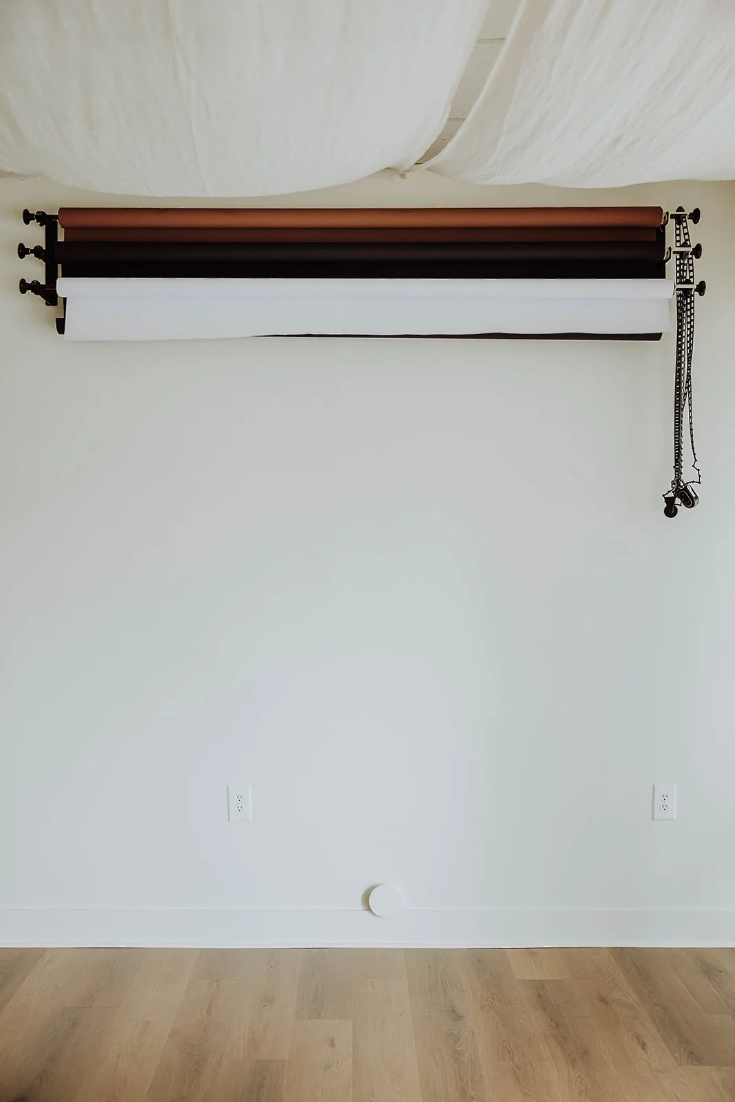 Seamless paper backdrop system at The ANS Collective photo studio in Grandville, MI