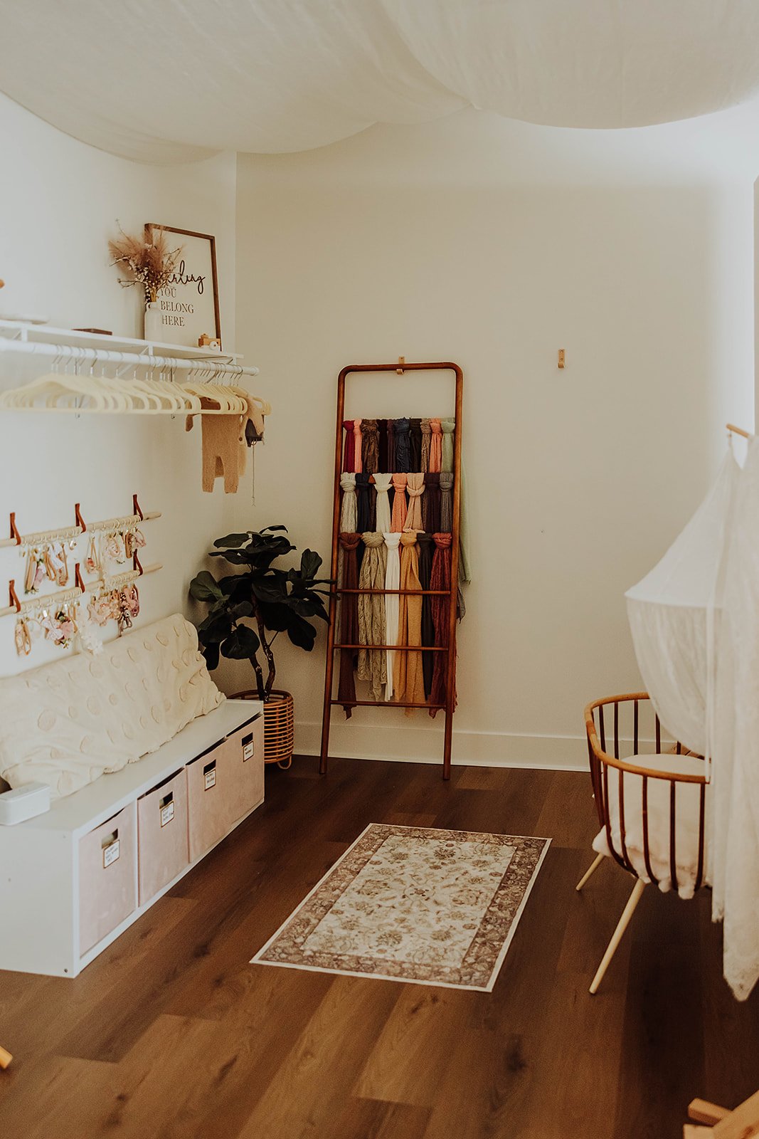 Newborn nook set with soft neutral props at The ANS Collective natural-light photo studio in Grandville, MI