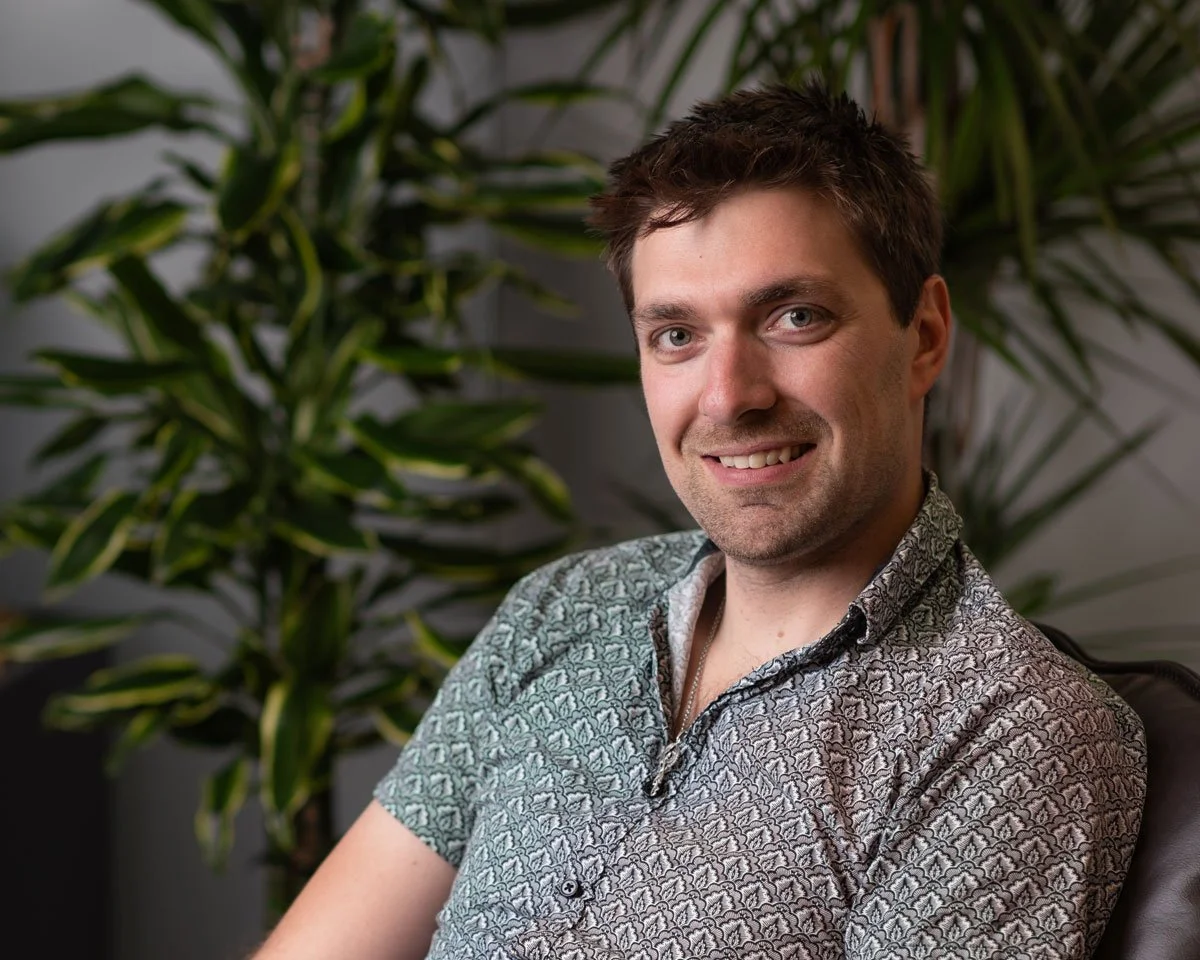 Dr Sage Robinson, Owner, Principal Occupational Hygienist, with a friendly smile