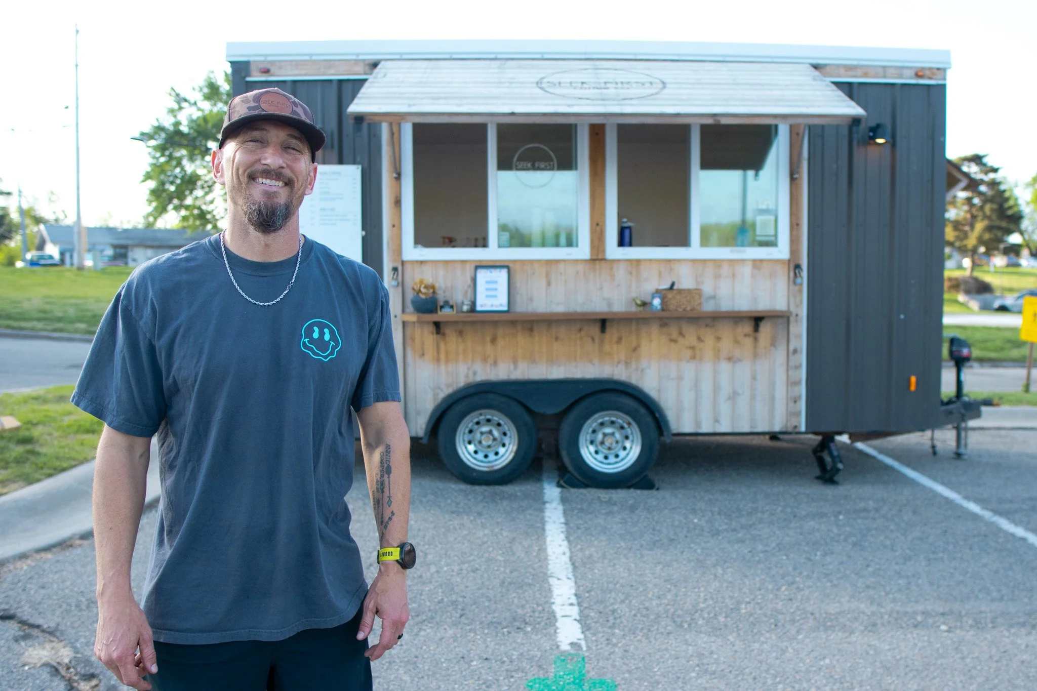 An image of the operator and owner and Coffee trailer.