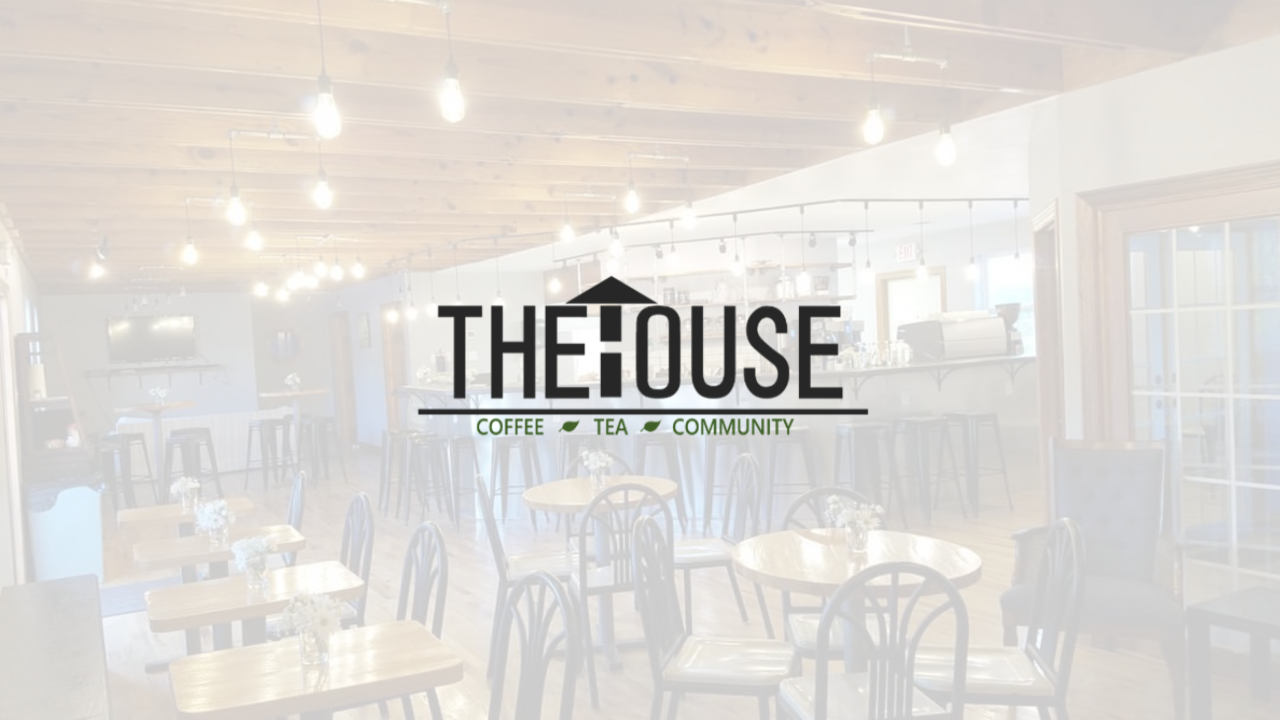 Image of interior of The House Café with Text of business name