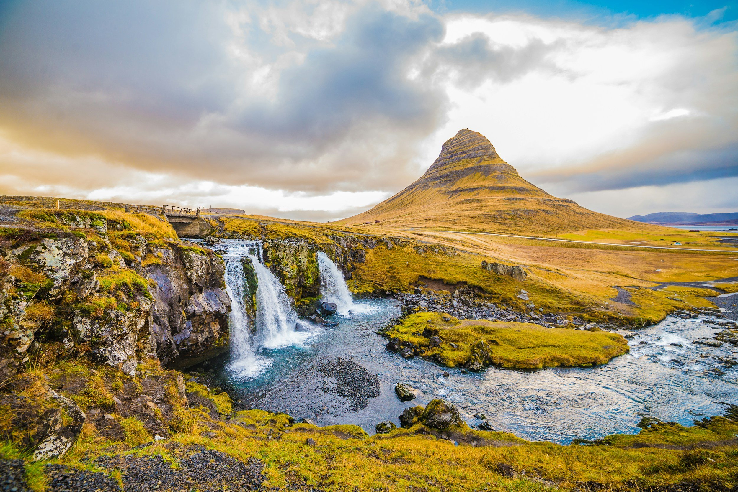 The iconic Kirkjufell mountain and waterfalls in Iceland; a signature discovery included in curated European itineraries by Willow & Wander Travel.