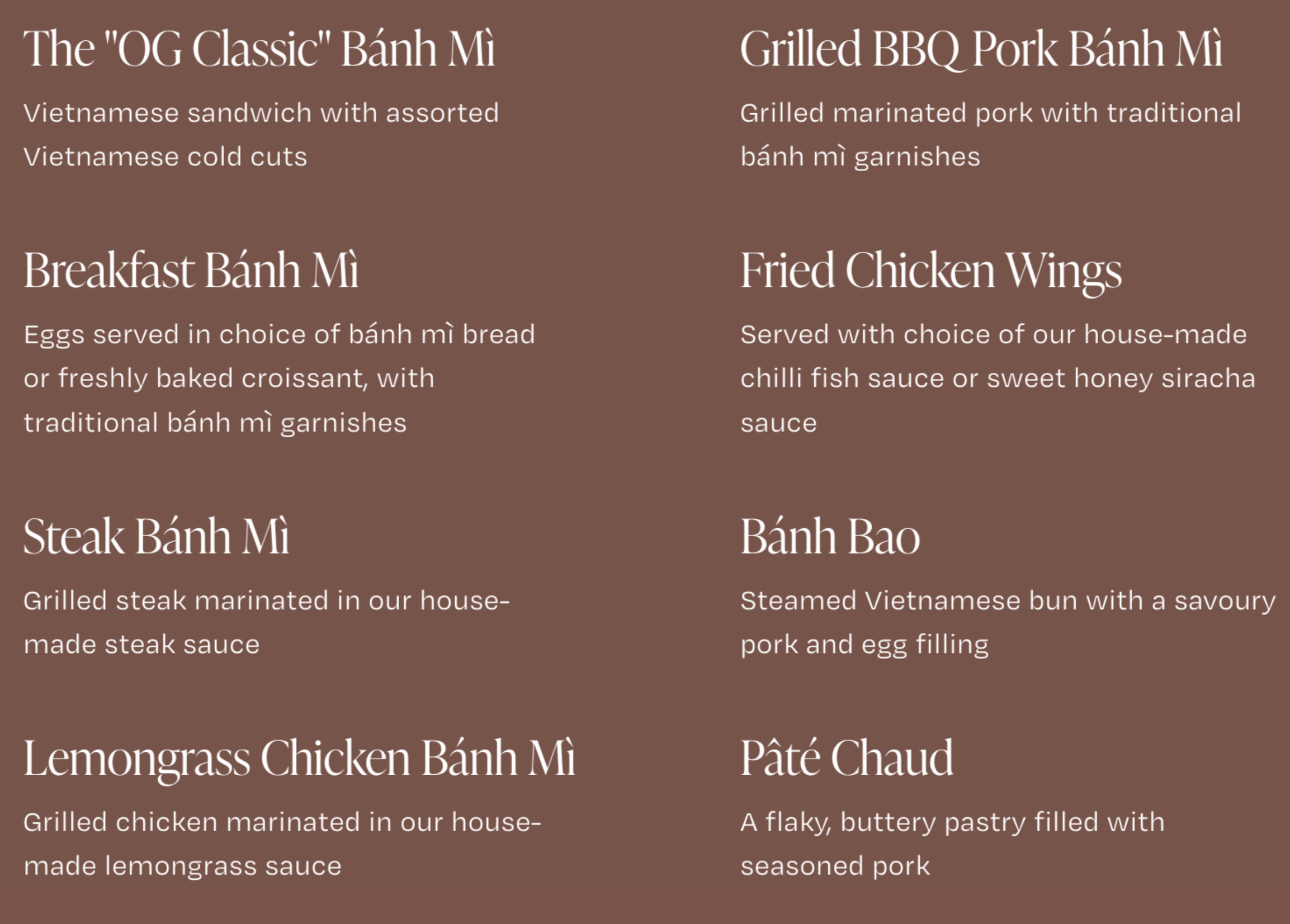 Menu with Vietnamese and American dishes including Bánh Mì, grilled BBQ pork, fried chicken wings, steak, Bánh Mì, bánh bao, Lemongrass chicken bánh mì, and pâté chaud.