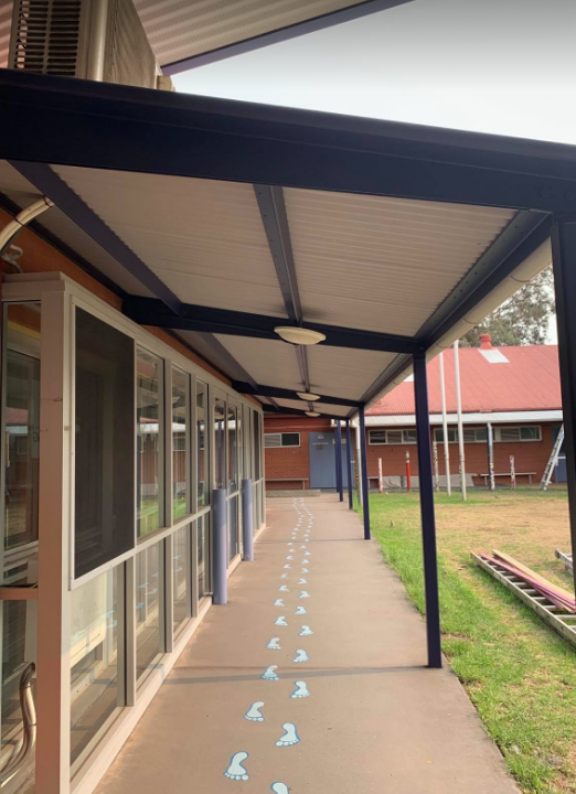 School repaint, exterior repainting of metal works in the school. 