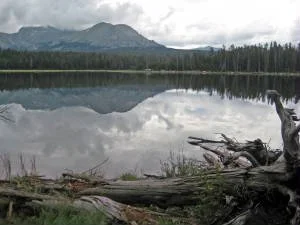 Mountain range reflected in lake.
