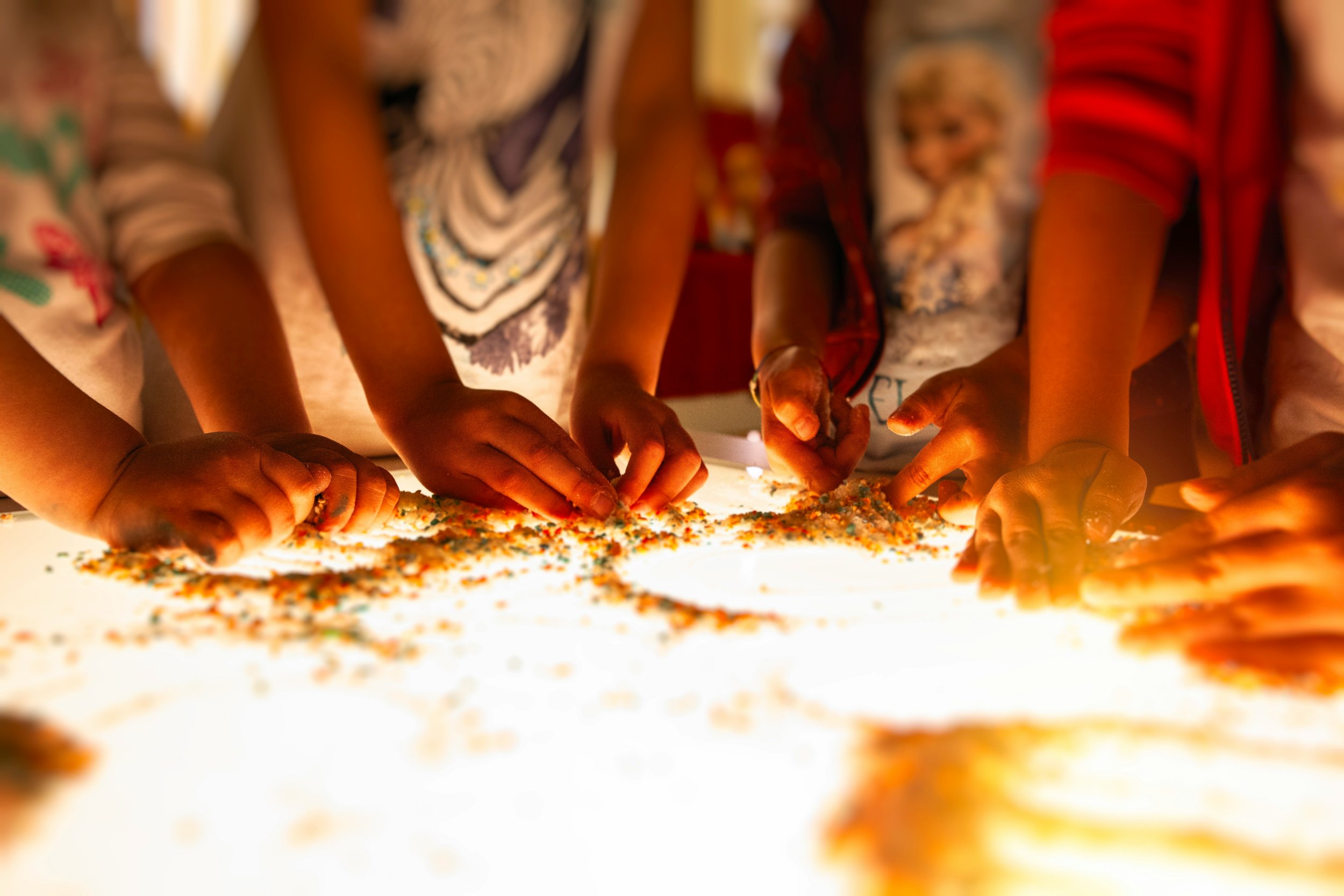 Children hands in warm golden light