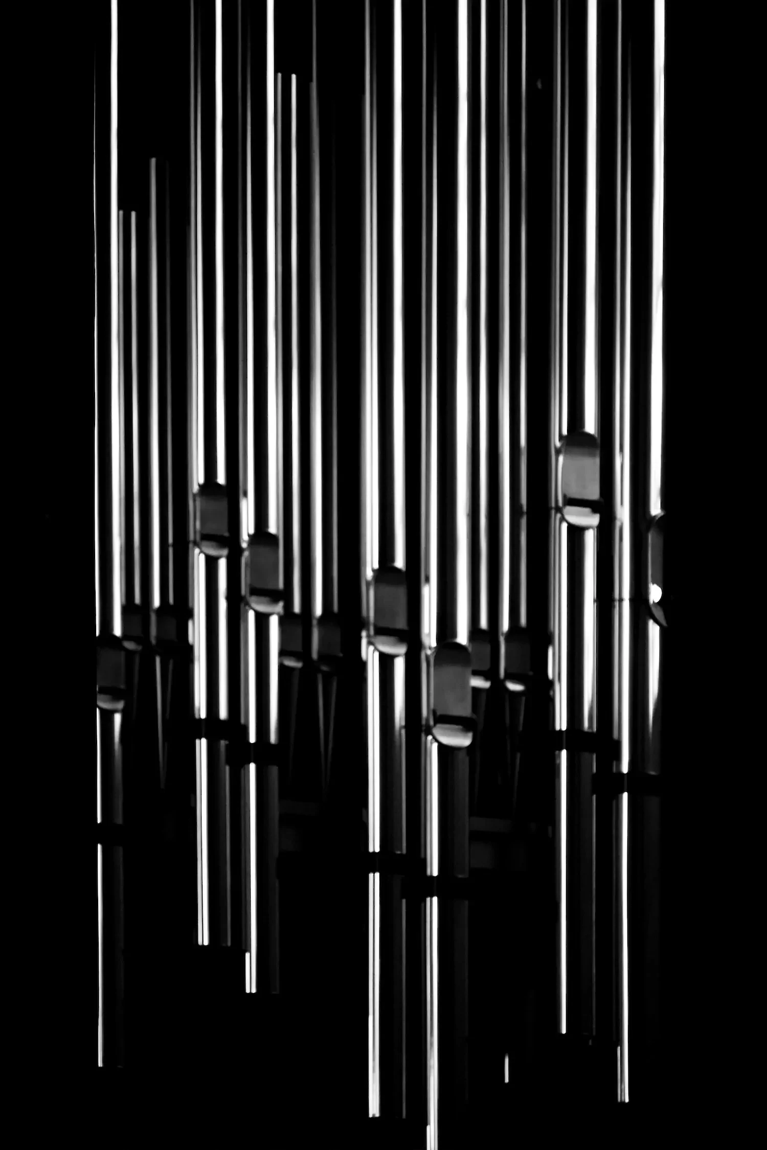 Album cover for Mixtures II portraying sliver pipes from an organ.