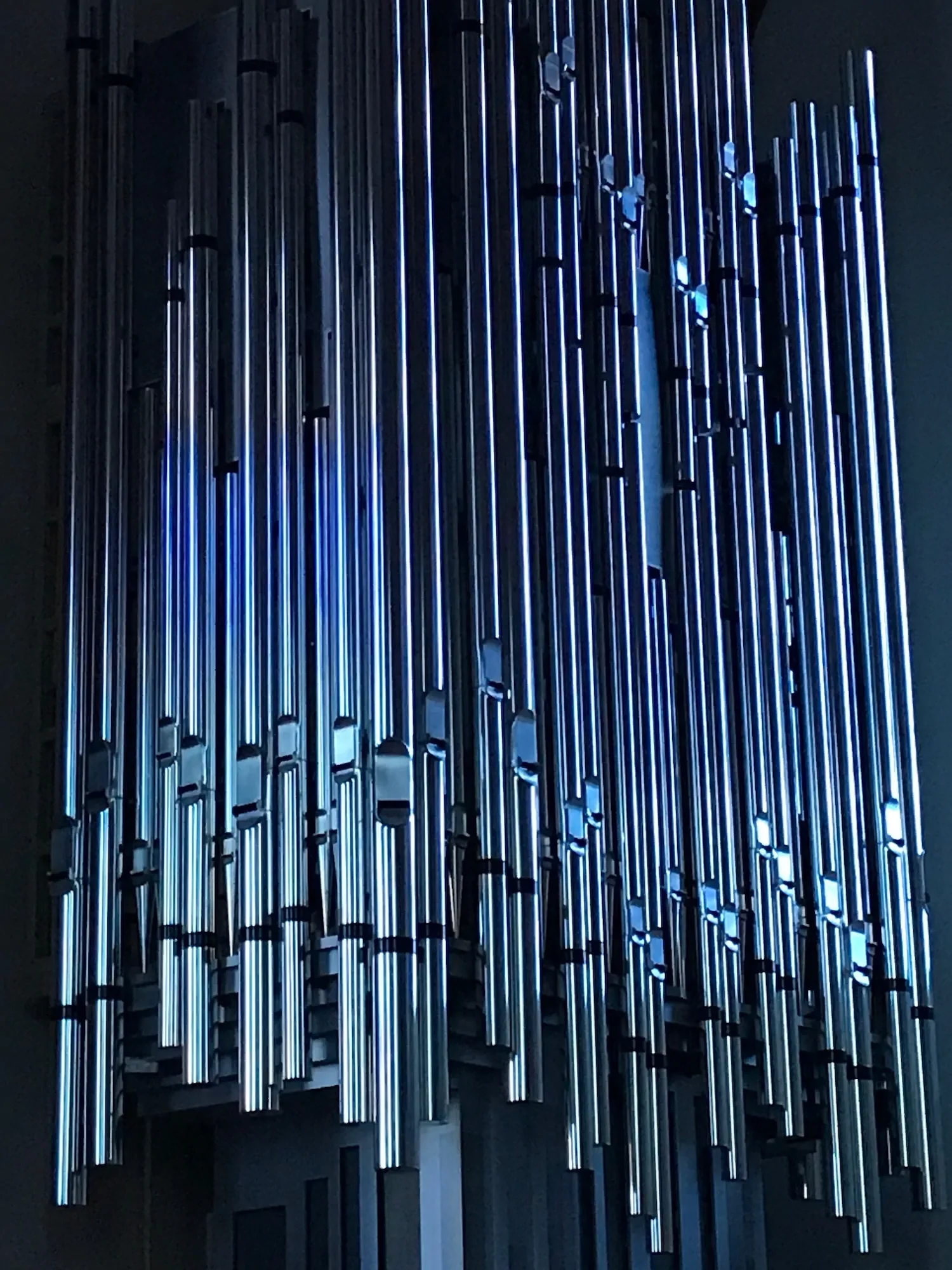 Album cover for Mixtures portraying blue-lit pipes from an organ.