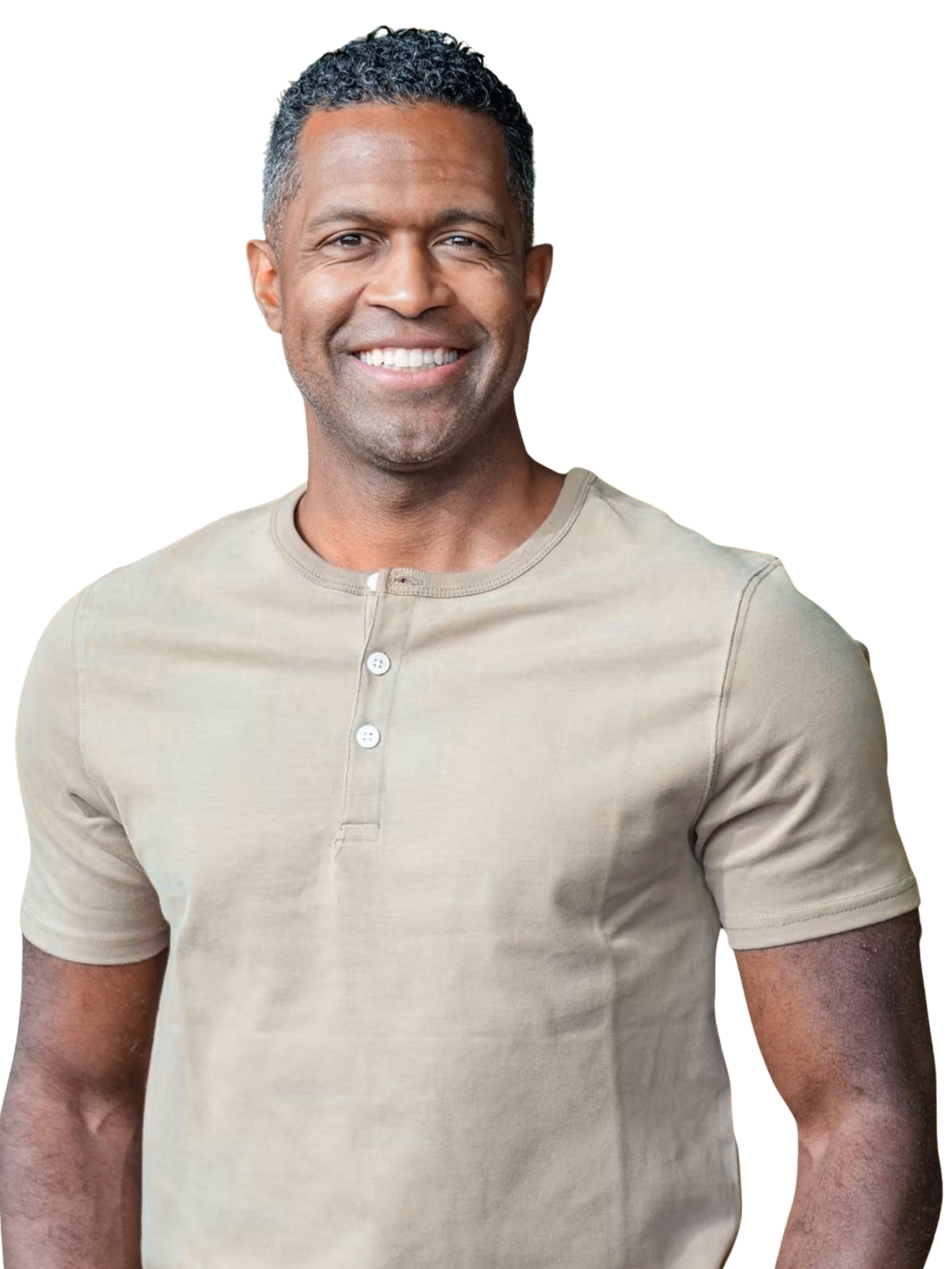 Smiling middle-aged man with short curly dark hair, wearing a beige short-sleeved henley shirt.