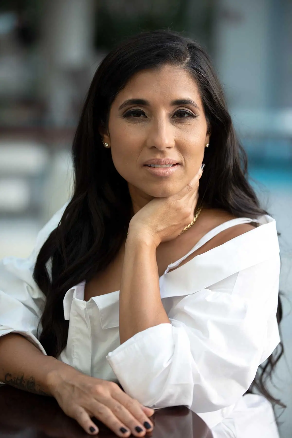 CHRISTINE ANDREU PUTTING SERVICE &amp; JUSTICE AT THE FOREFRONT