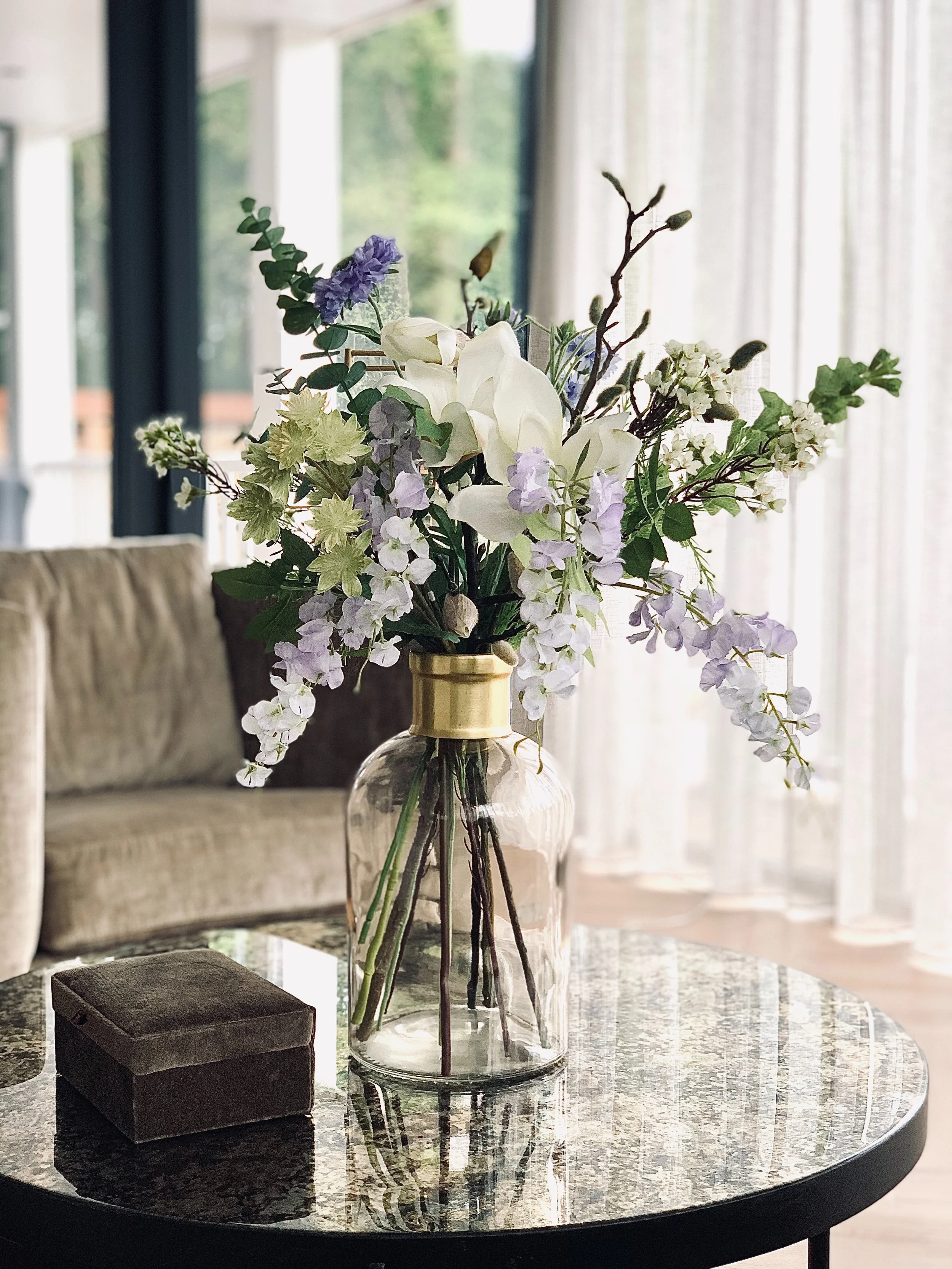 Preserved floral display flowers vase in a high end luxury home interior space