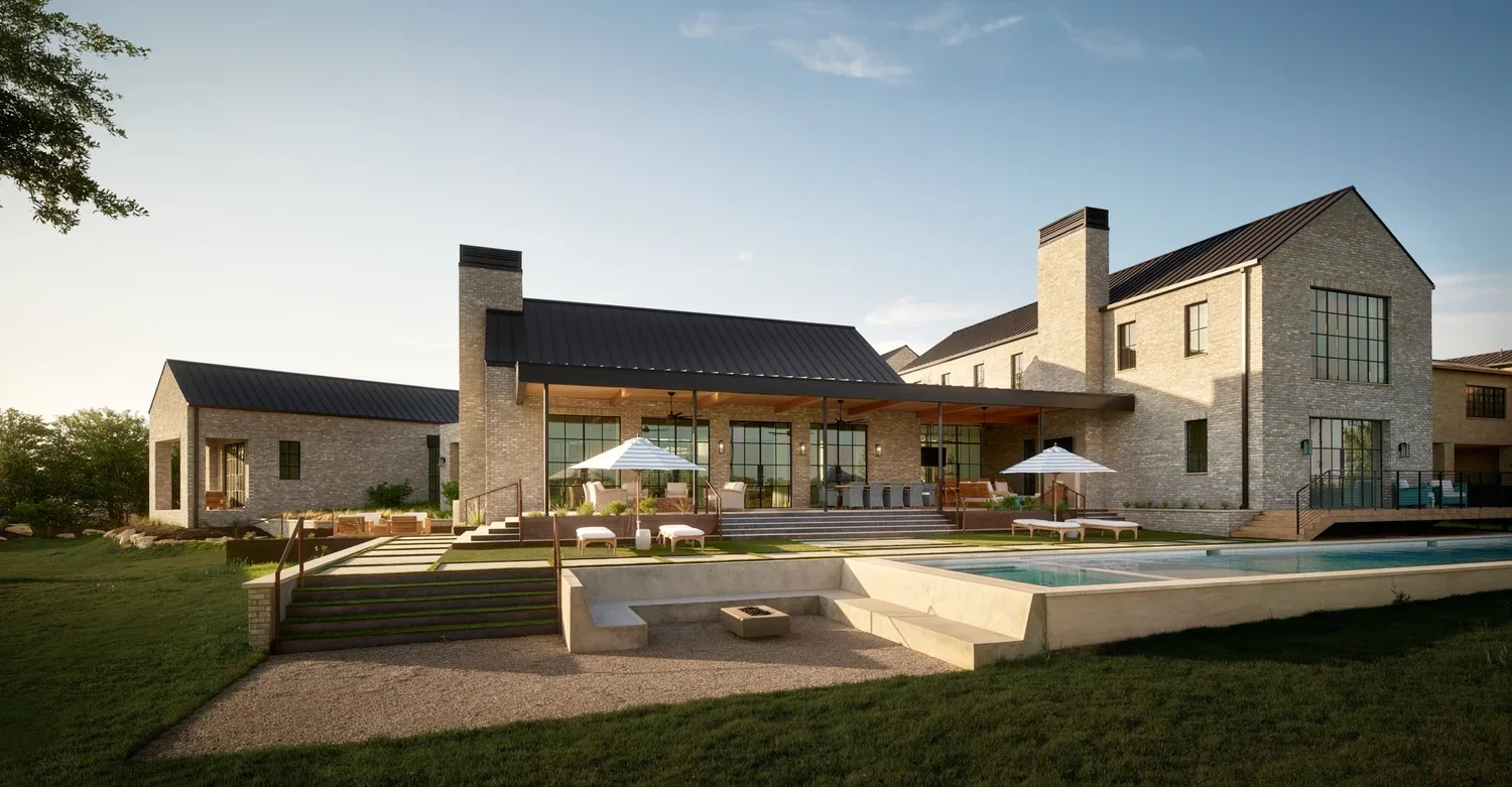 Modern two-story house with brick exterior, large windows, outdoor patio with umbrellas, and a swimming pool in the backyard.