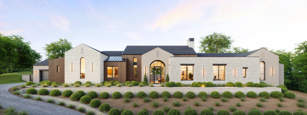 Modern large house with white brick and wooden accents, surrounded by landscaped greenery and a curved driveway.