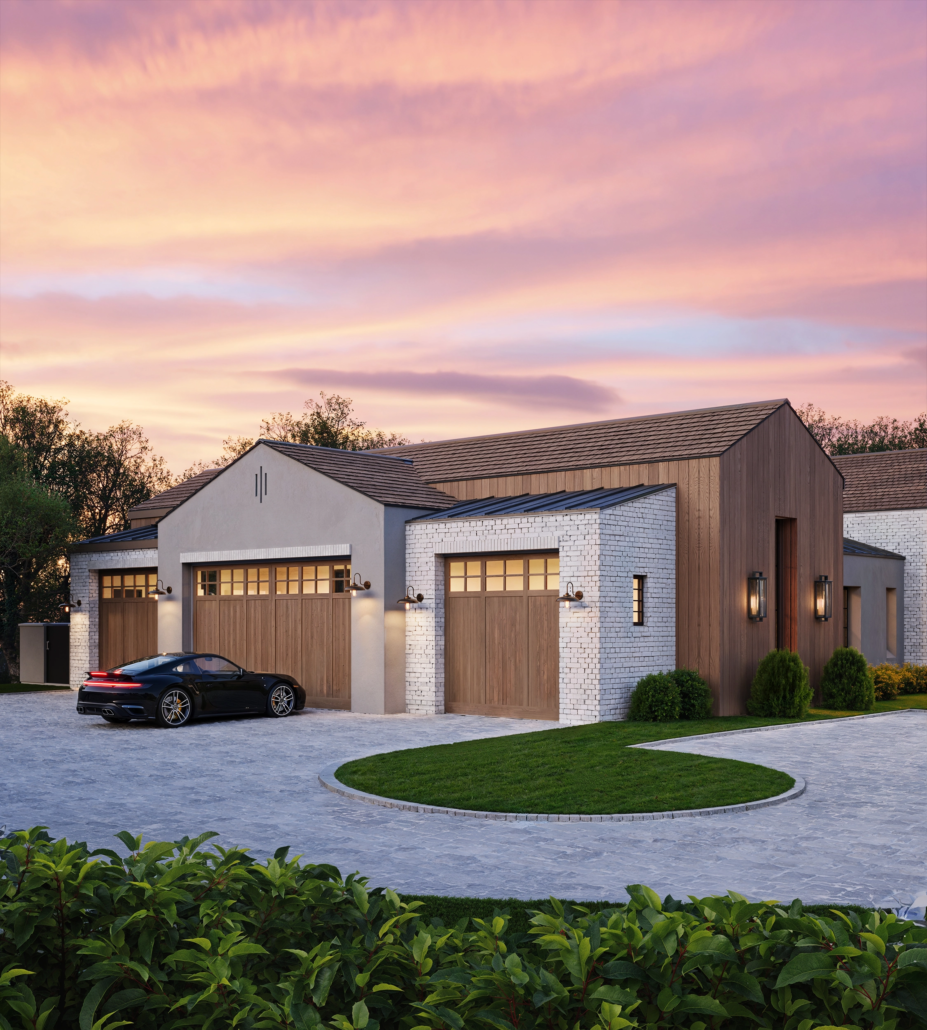A modern house with three garage doors at sunset. The house features a combination of white brick, wood, and gray concrete exterior with outdoor lighting and neatly maintained landscaping, including bushes and a small circular lawn.