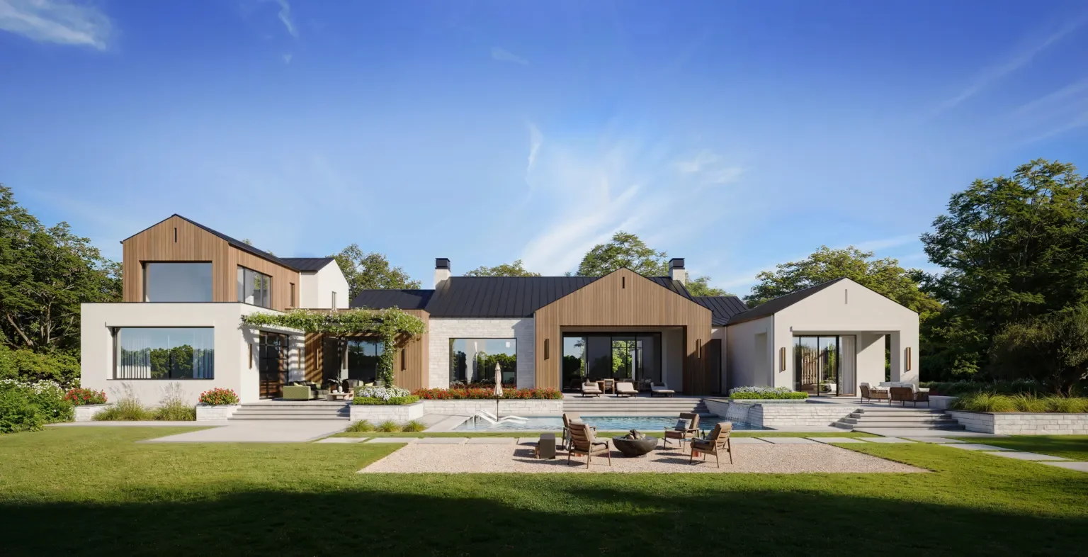 Modern house with white and wood exterior, large glass windows, a backyard with a lawn, patio furniture, a fire pit, and a pool, surrounded by trees under a clear blue sky.