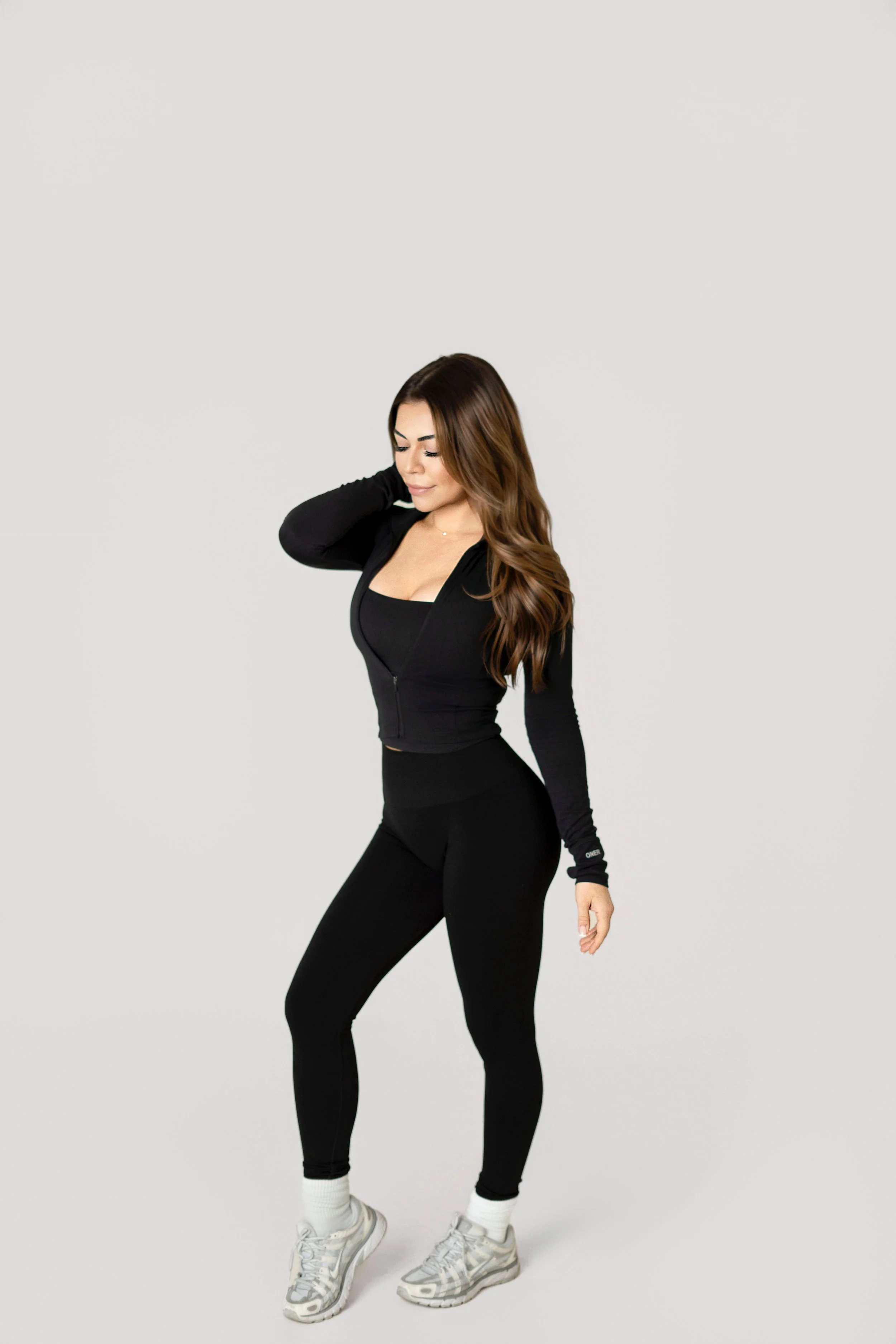 Women's small group fitness class at Motion by Mia studio