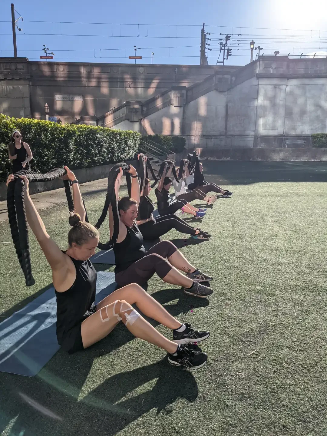 group fitness class doing sit ups