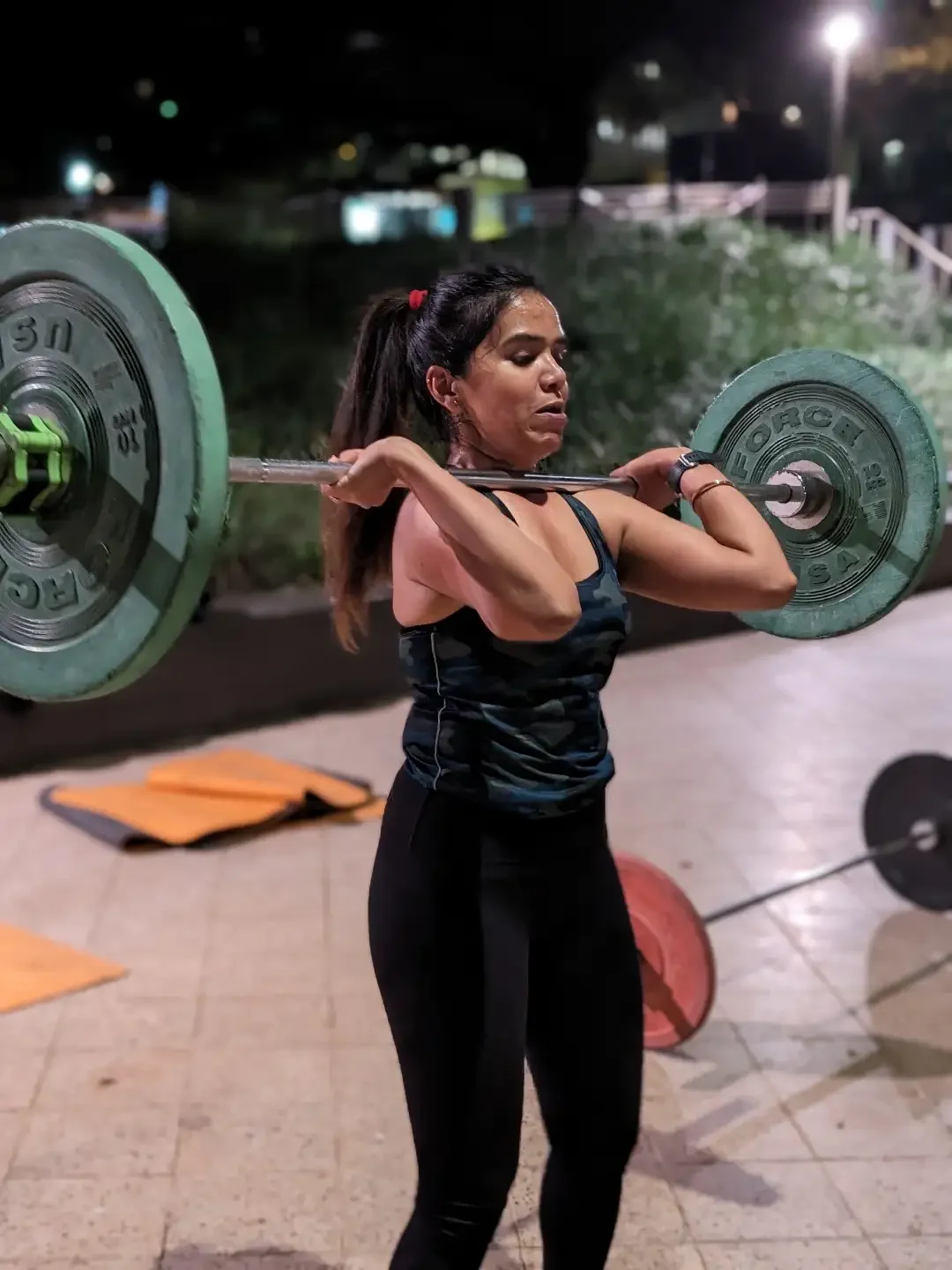 woman lifting weights during spartan class in milsons point kirribilli
