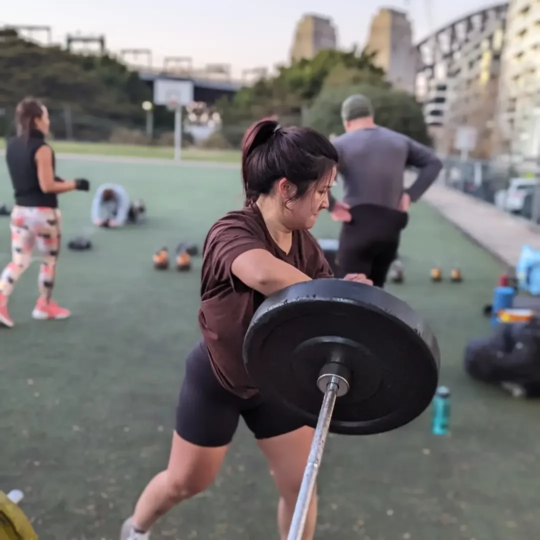 morning strength training class outdoors in kirribilli