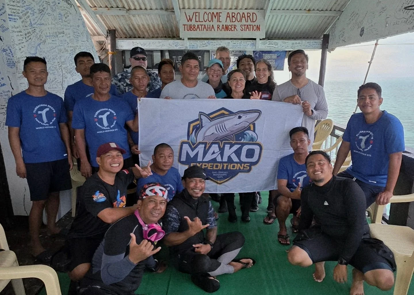 All smiles at the Ranger Station!

@makoexpeditions Tubbataha crew at the @tubbatahareefs Ranger Station with @dive.resolute dive team and the heroes of the reef&mdash;the rangers themselves!