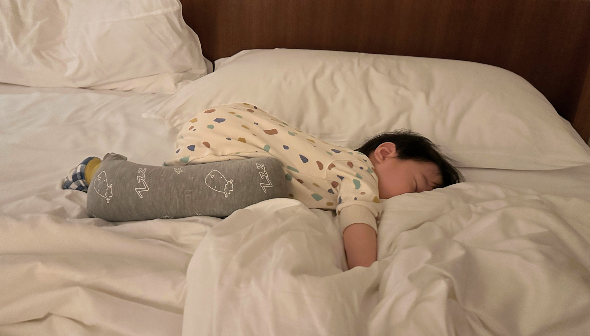 Baby sleeping soundly in winter at Conrad Tokyo room