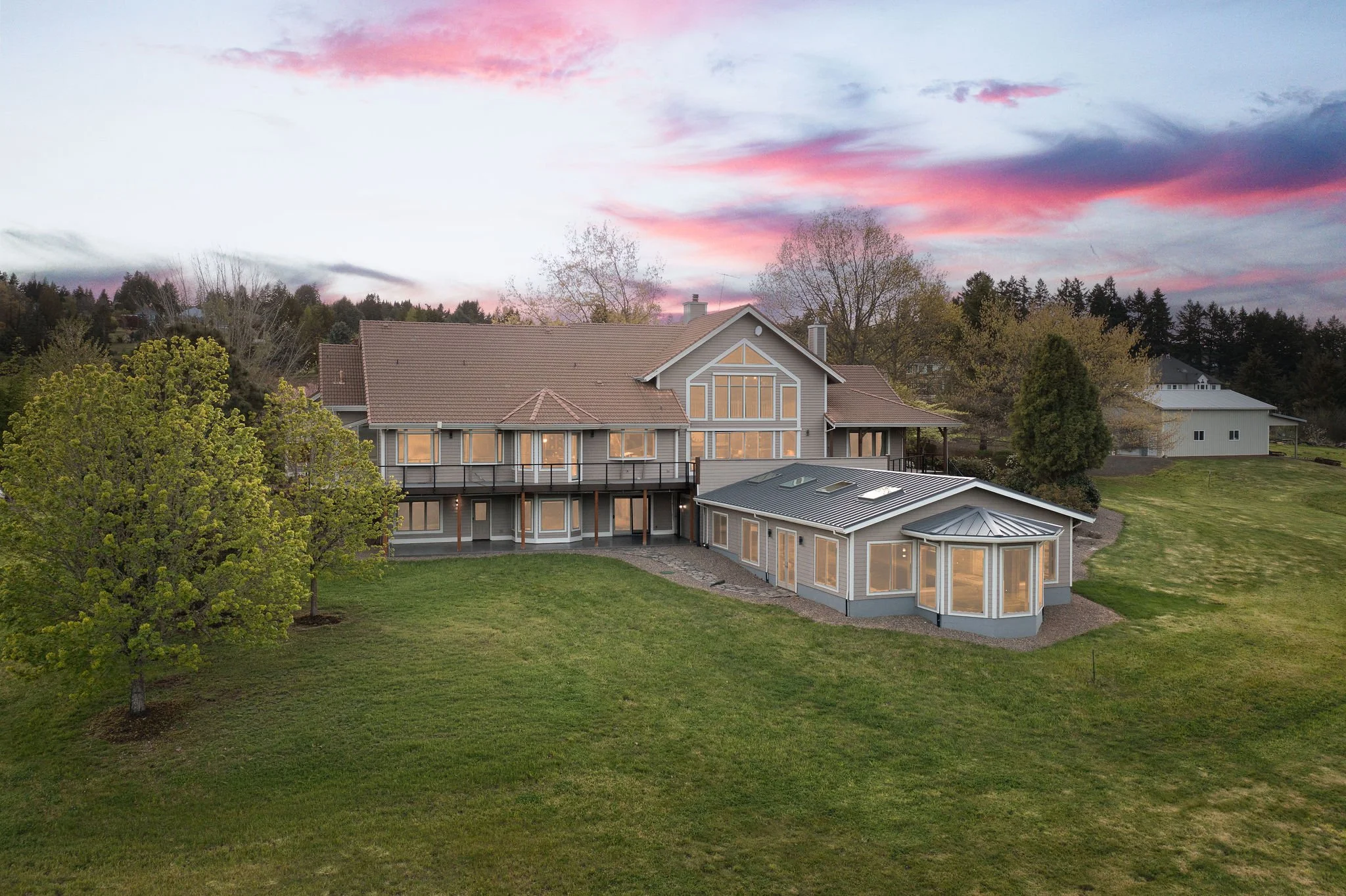 SW Laurel Back of home with pool twilight web.jpg