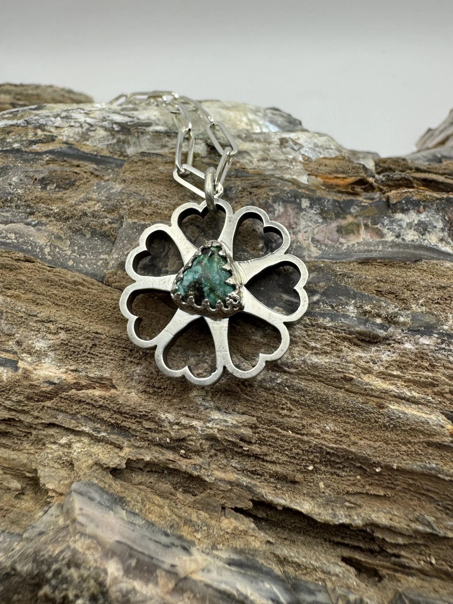 African Turquoise Heart Spur Roller Pendant