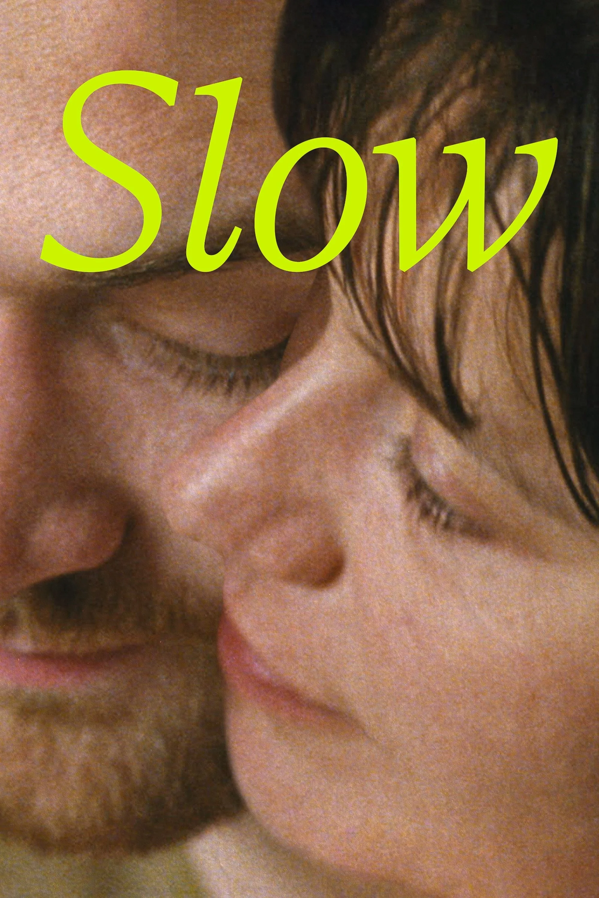 Close-up of a person's face, showing closed eyes and wavy brown hair, with the word 'SLOW' in bright yellow text overlay.