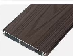 Close-up of a wood-textured aluminum extrusion.