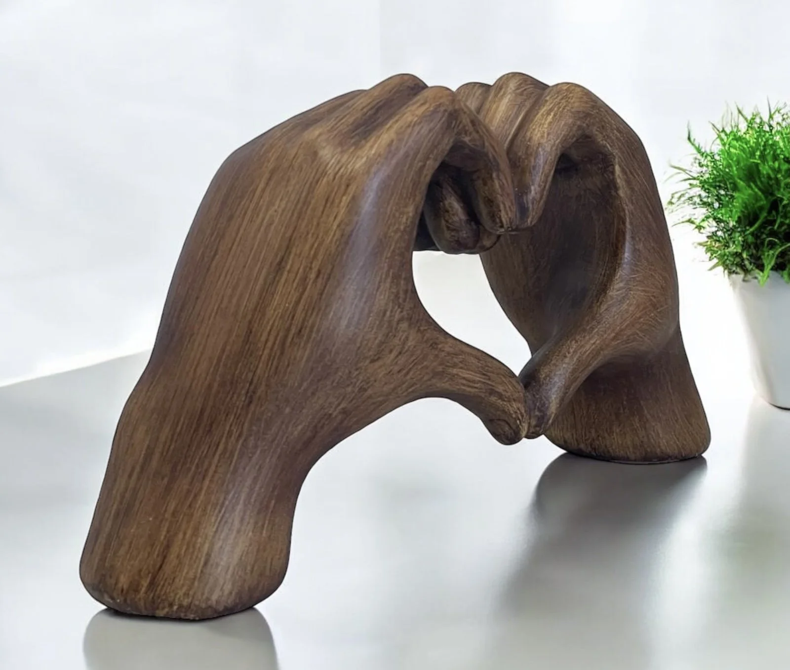 wooden colour heart hands.jpg
