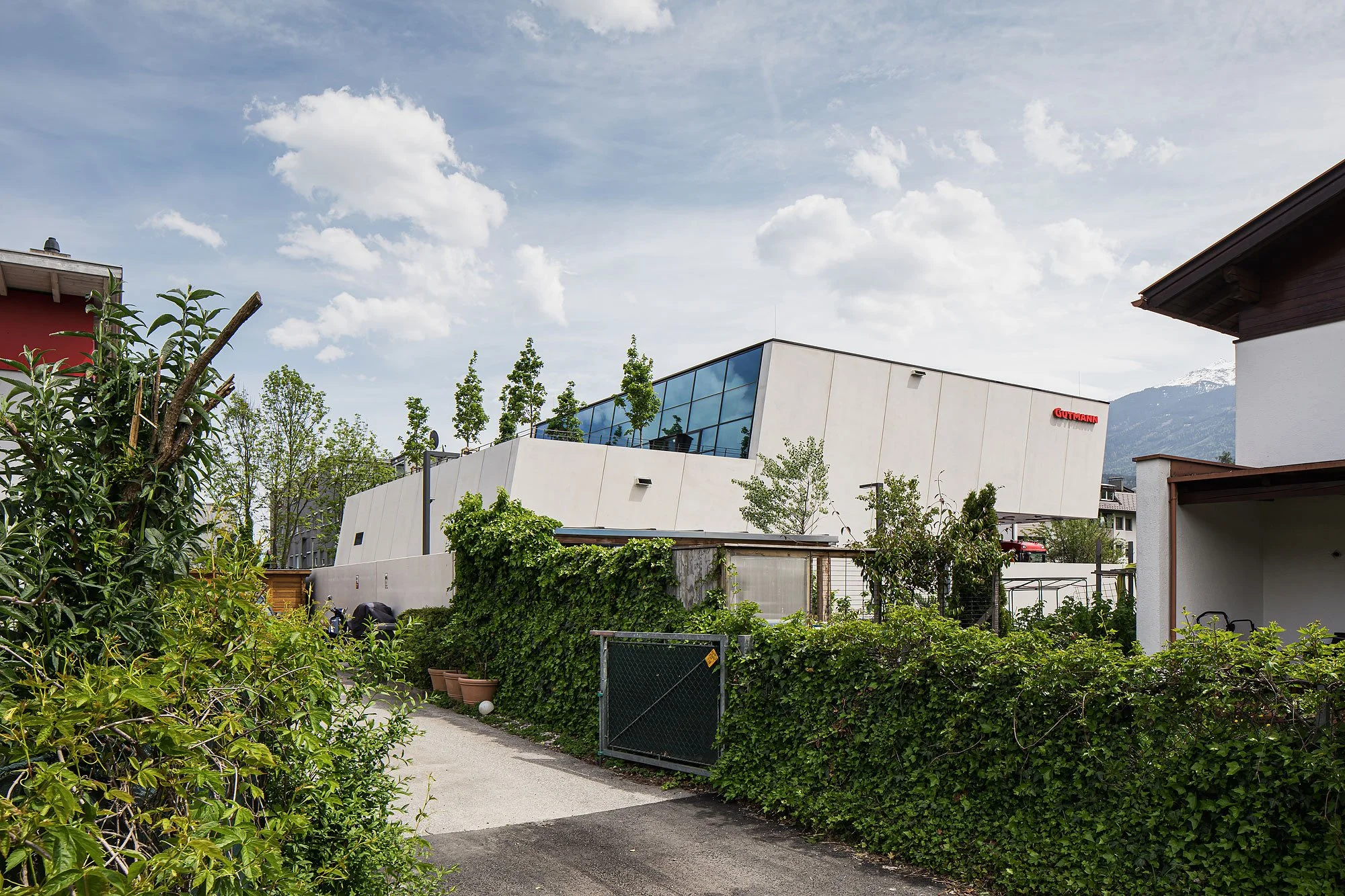 Bürogebäude mit Tankstelle, Innsbruck, Obermoser + Partner Architekten, Gutmann, Christian Flatscher, Architekturfotografie, Fotografie, Architektur, Tirol
