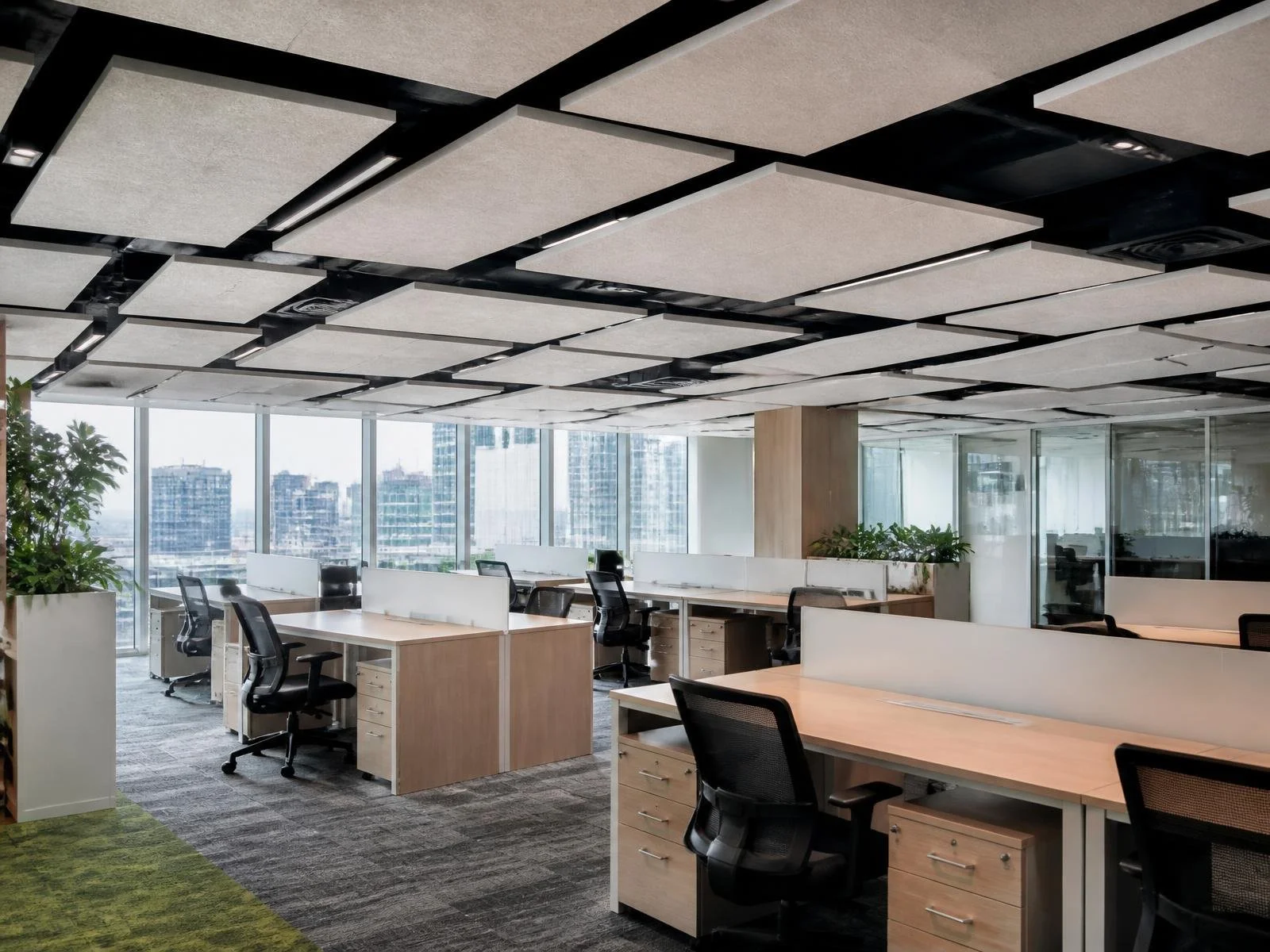 Open-plan office workspace with employees working at desks