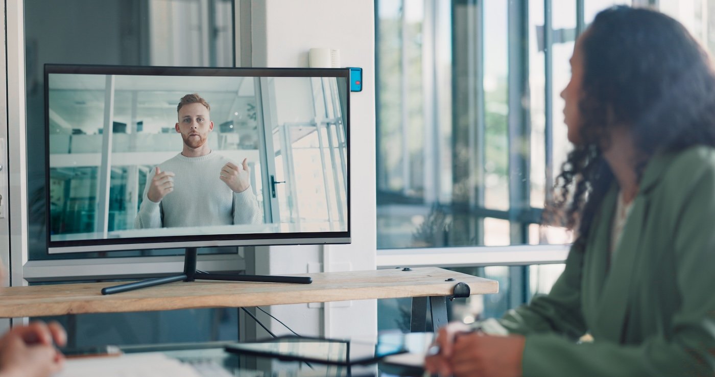 woman watching a male online training