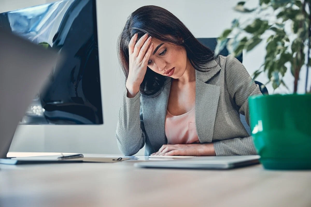sad woman at work