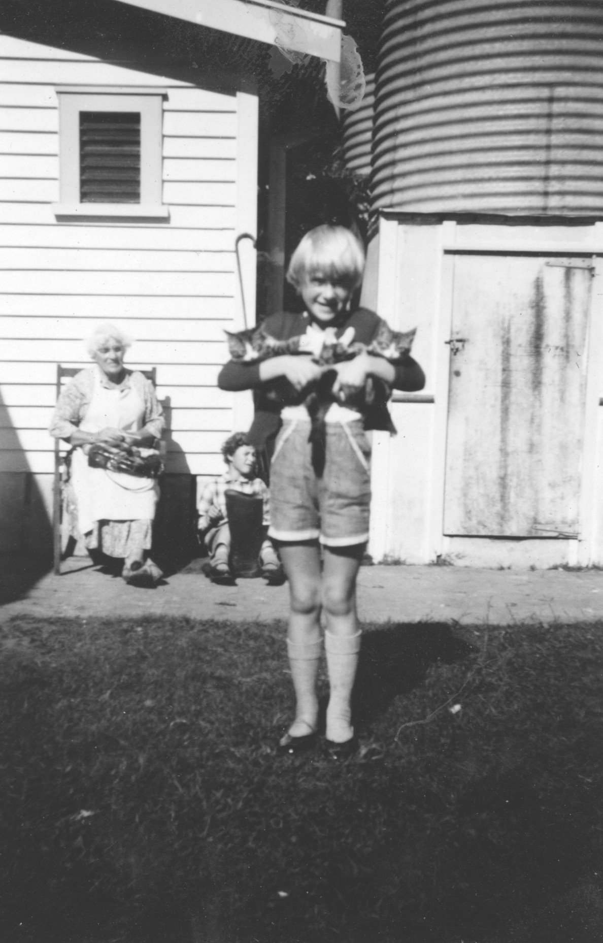 Huston Family Archive - Christine with Nan and Jane in background.