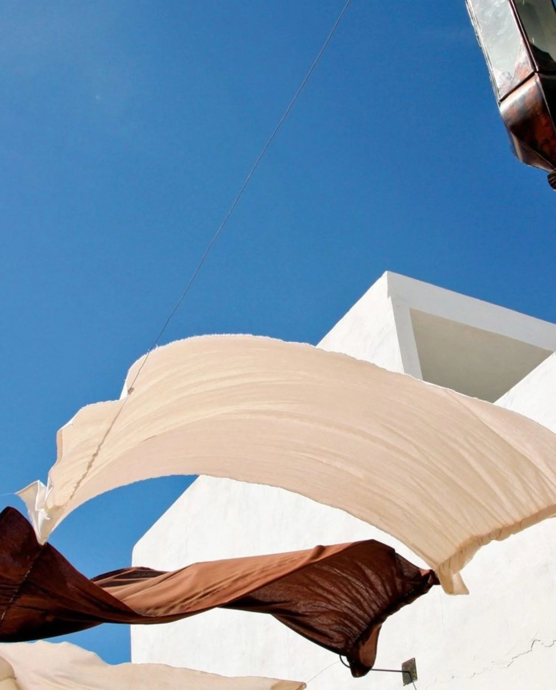 Collected in Tarifa.

Blue skies.
White walls.
The quiet beauty of things in motion.