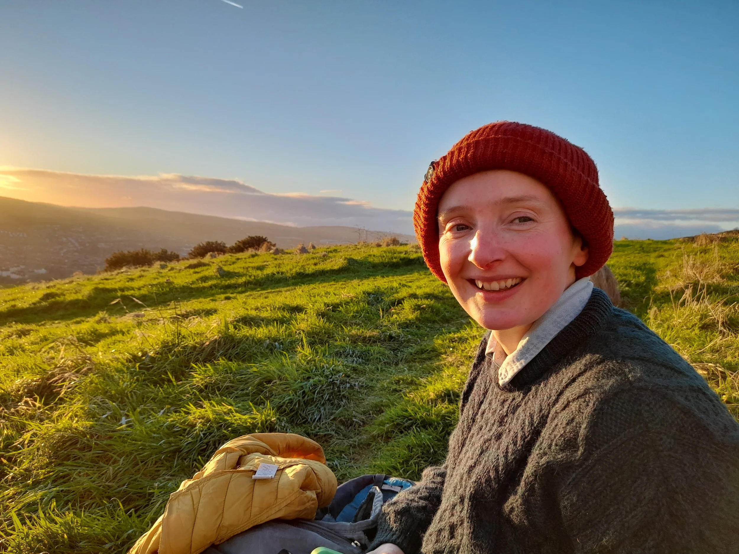 Miriam Turley sitting in a field