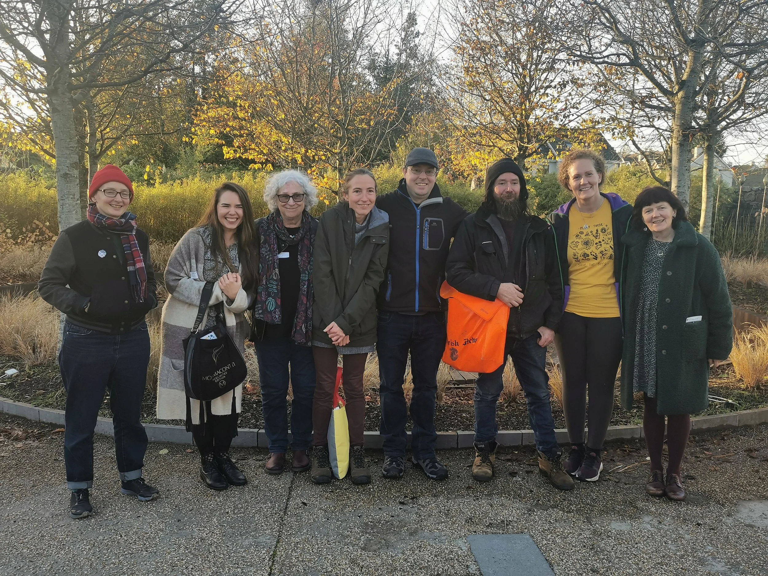 A photo of Community Growing Ireland and the Community Garden Support Committee standing in the sunshine
