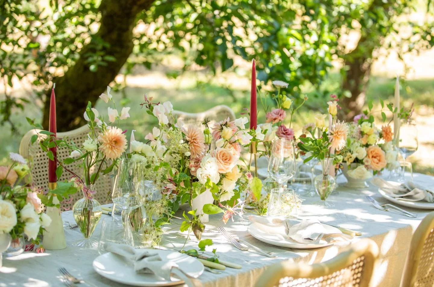 A table amongst the apple trees.

Late summer flowers, the last of the sweet peas and the start of the dahlias, while the hedgerows are filled with trailing old man&rsquo;s beard and pink honeysuckle &mdash; both so beautiful tucked into arrangements