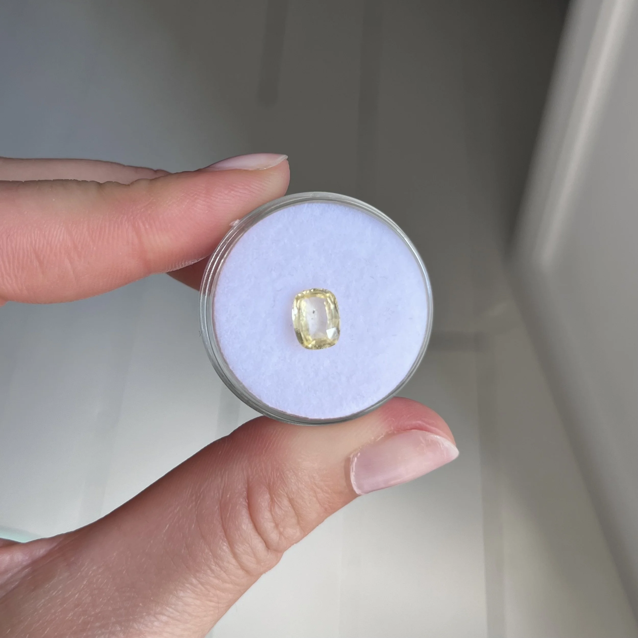 1.40-carat cushion-cut yellow sapphire