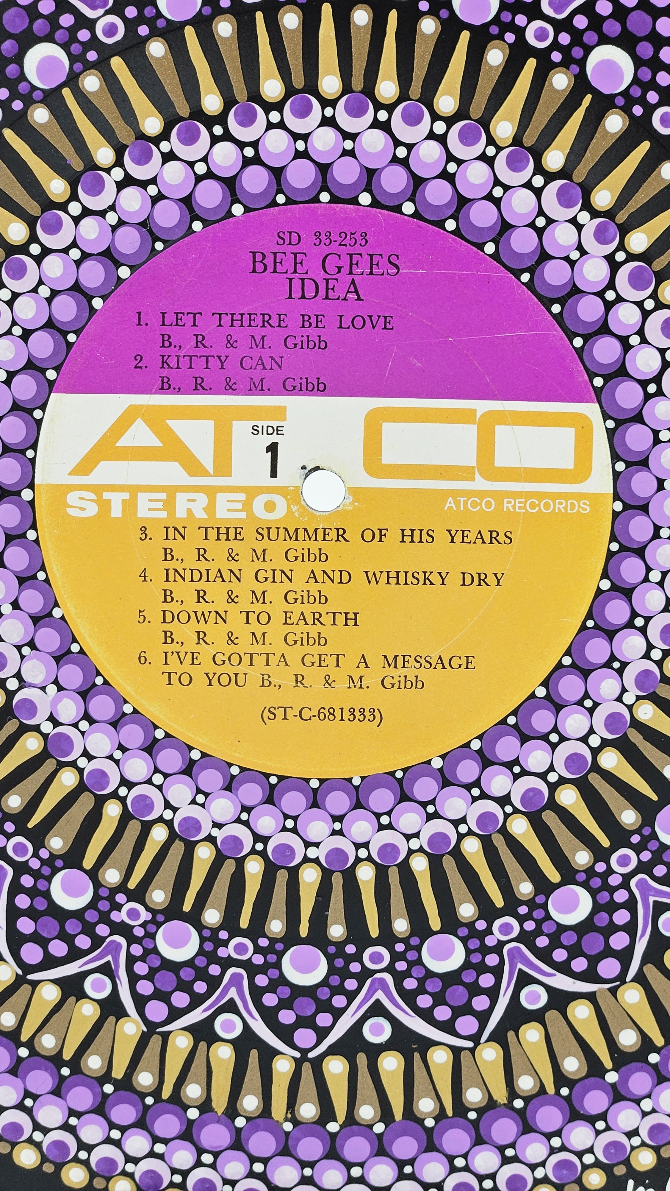 Close-up of the Bee Gees Idea Side 1 record label surrounded by hand-painted mandala artwork