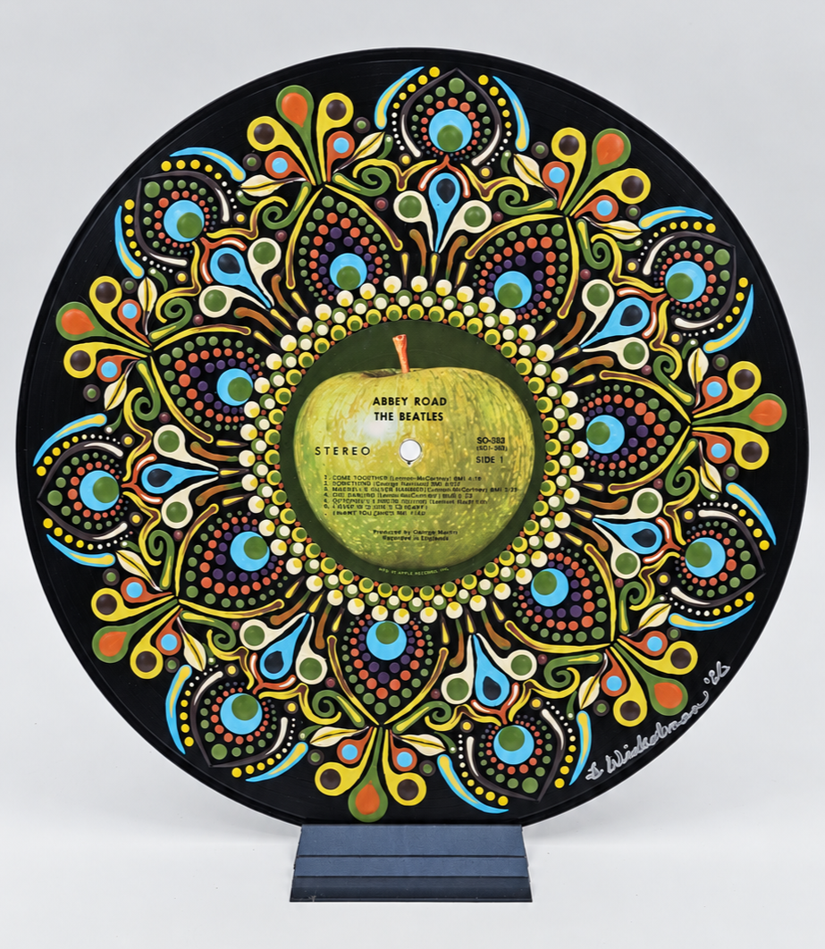 fHand-painted Beatles Abbey Road vinyl record with original Apple Records label preserved.