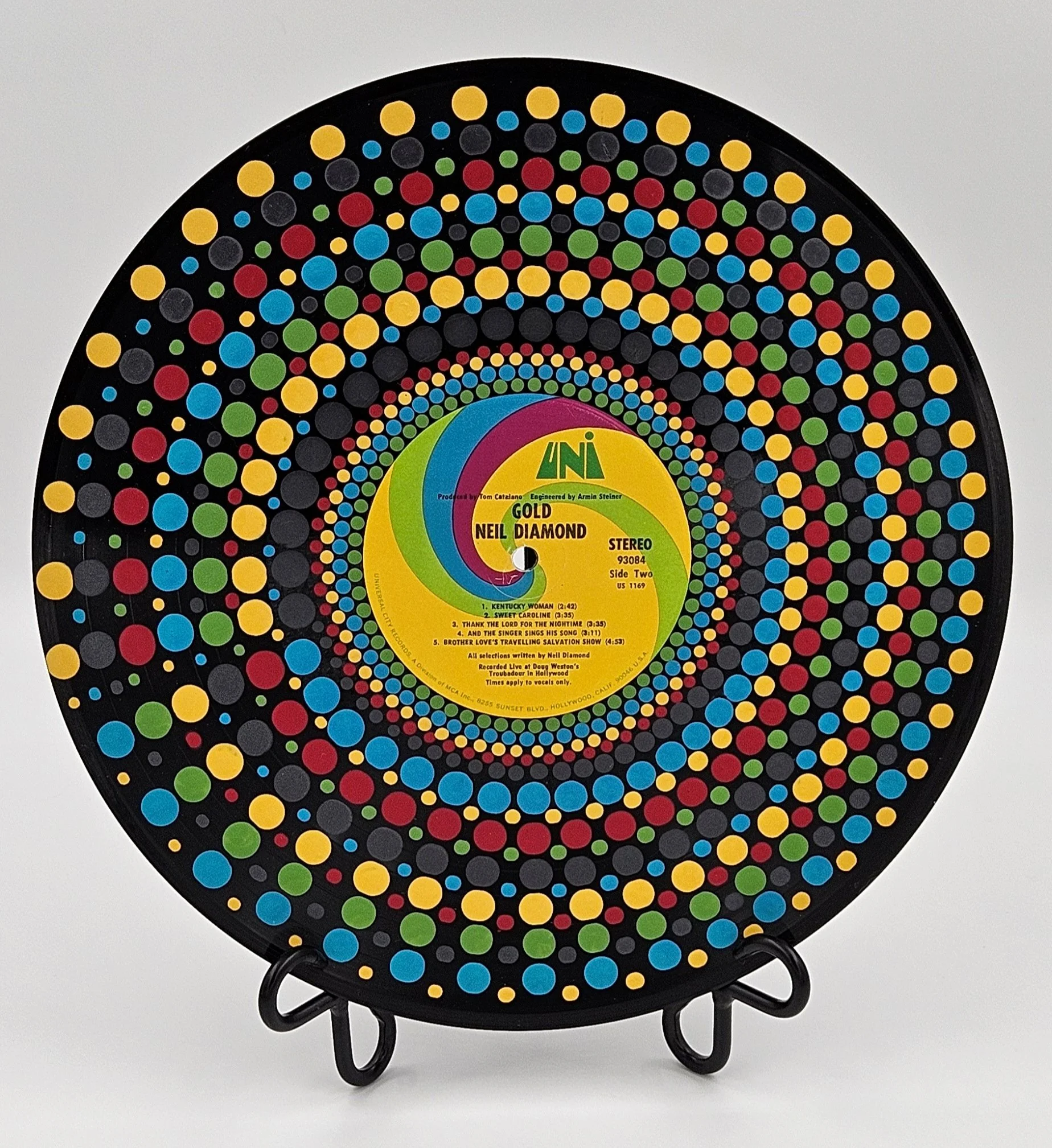 Neal Diamond vinyl art with a swirl on the record label and painted on the record.