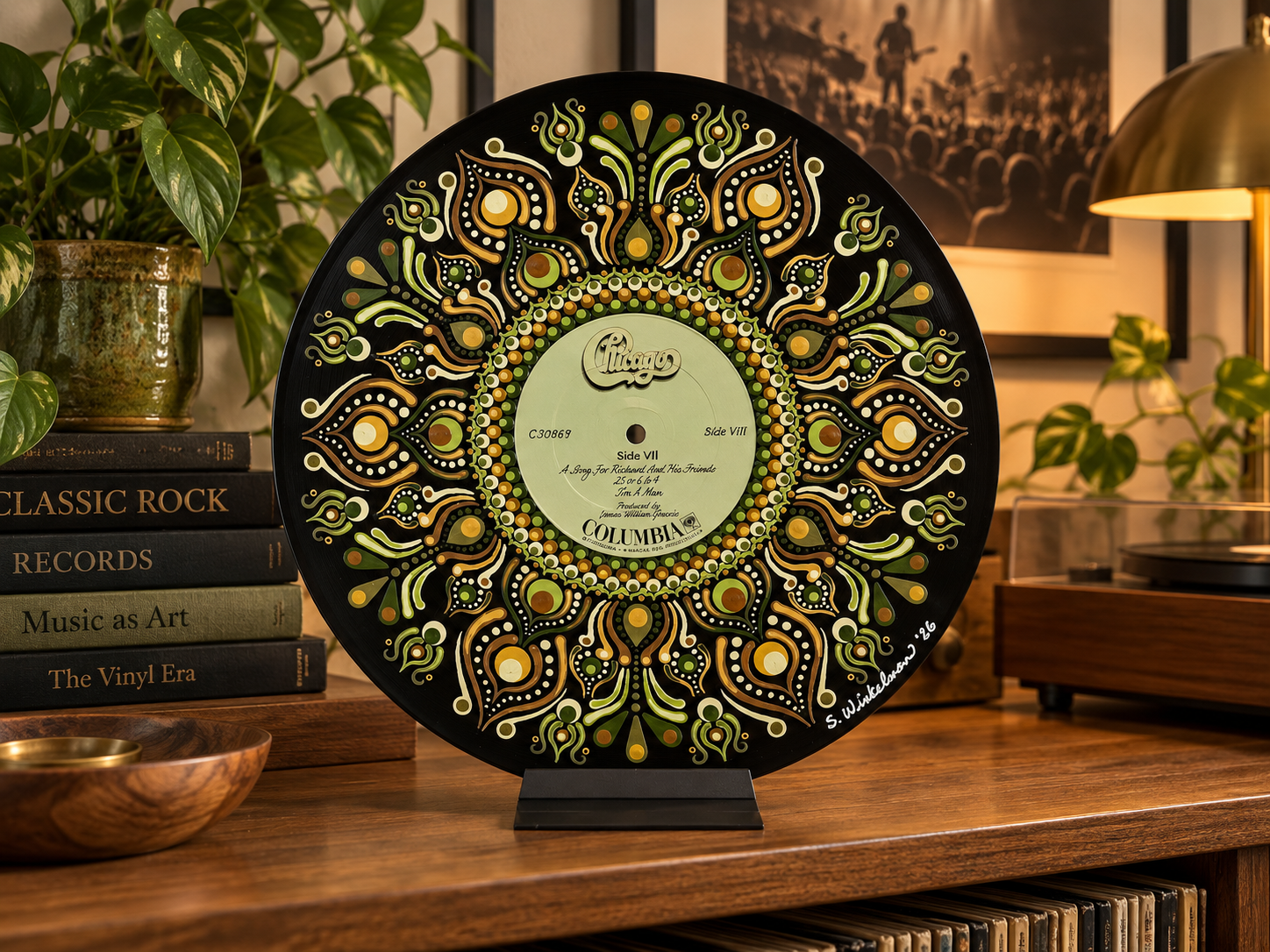 Chicago At Carnegie Hall hand-painted vinyl record art displayed unframed on a tabletop stand in a classic rock inspired room
