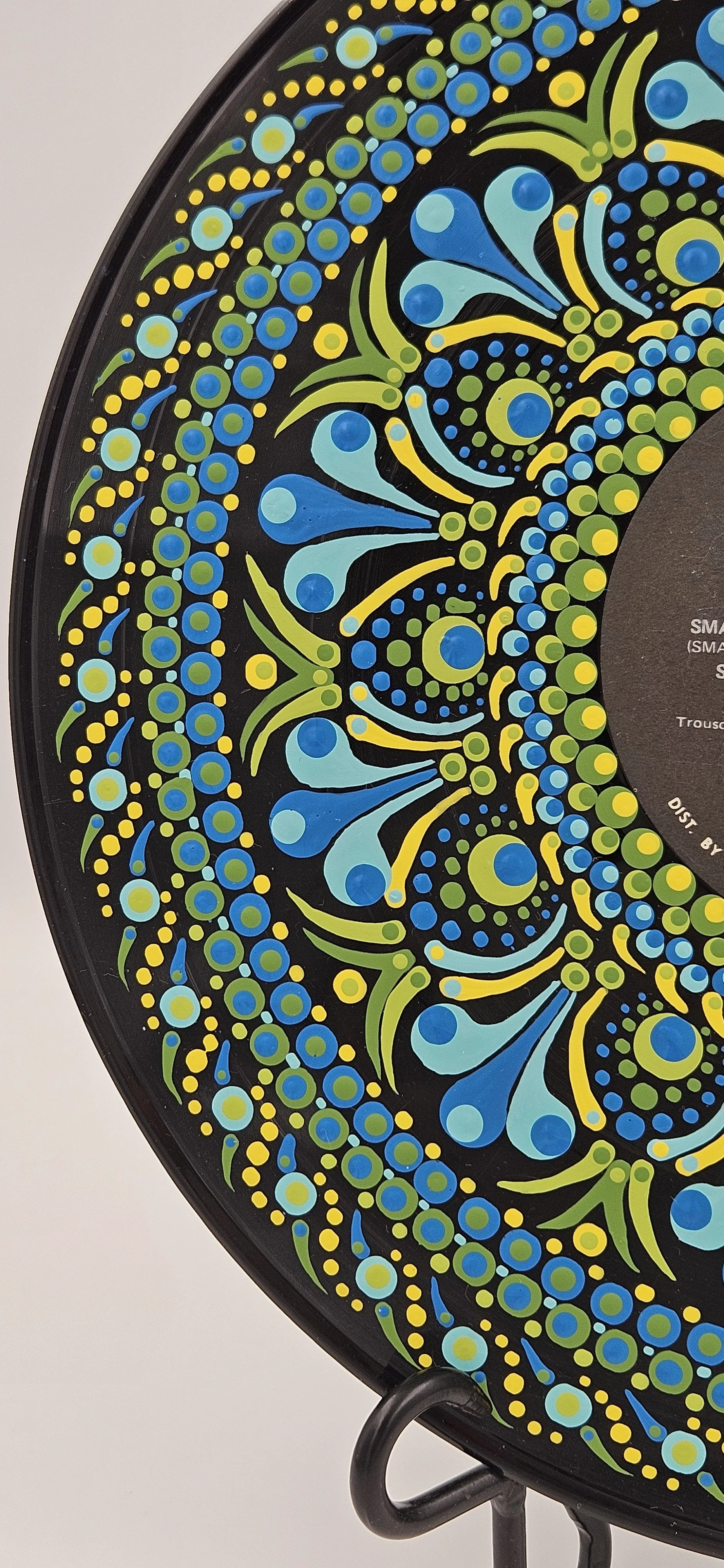 Close-up of the Three Dog Night Naturally Side 1 record label surrounded by hand-painted mandala artwork